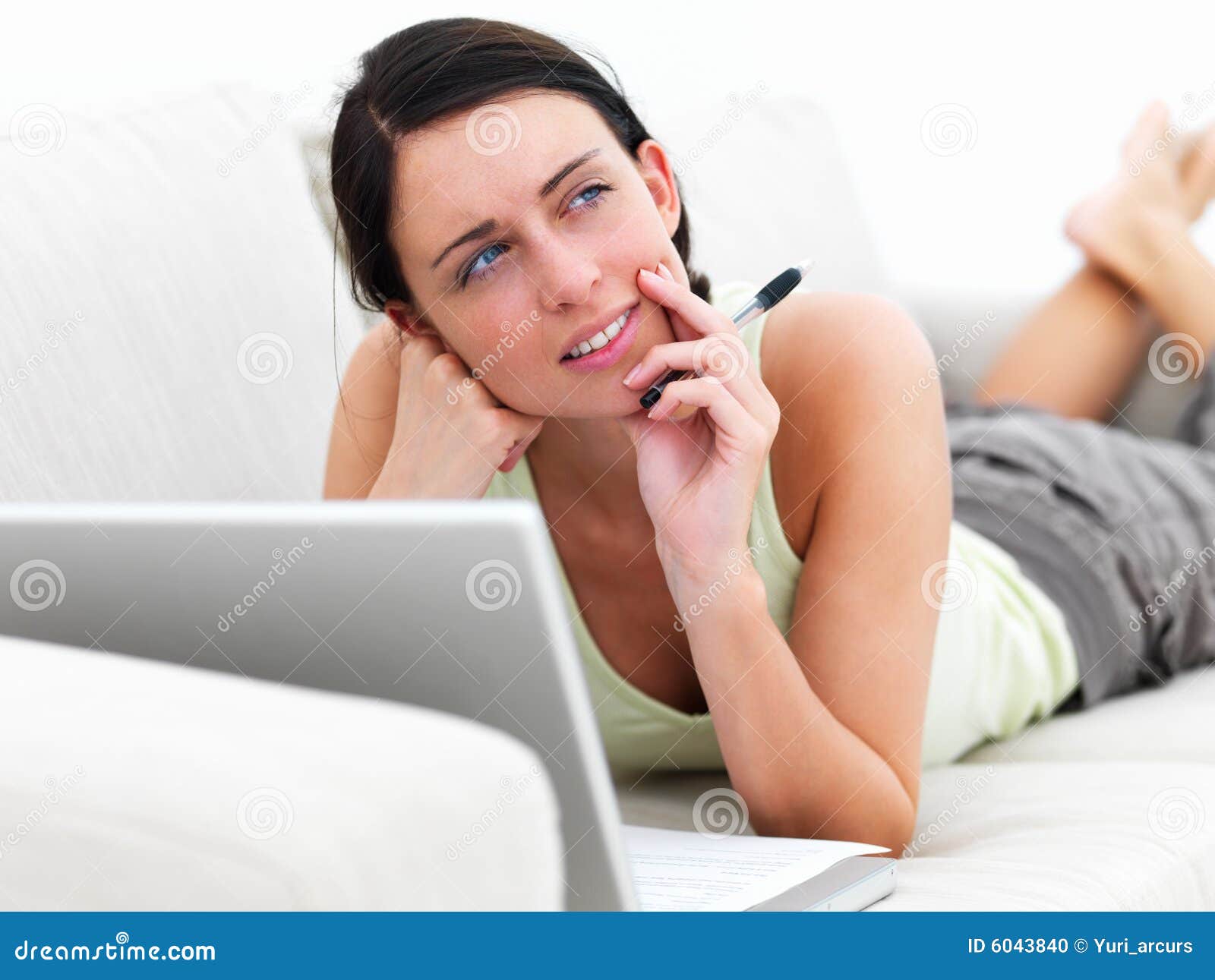 Woman Laying on Sofa Thinking,with Laptop Stock Photo - Image of female ...