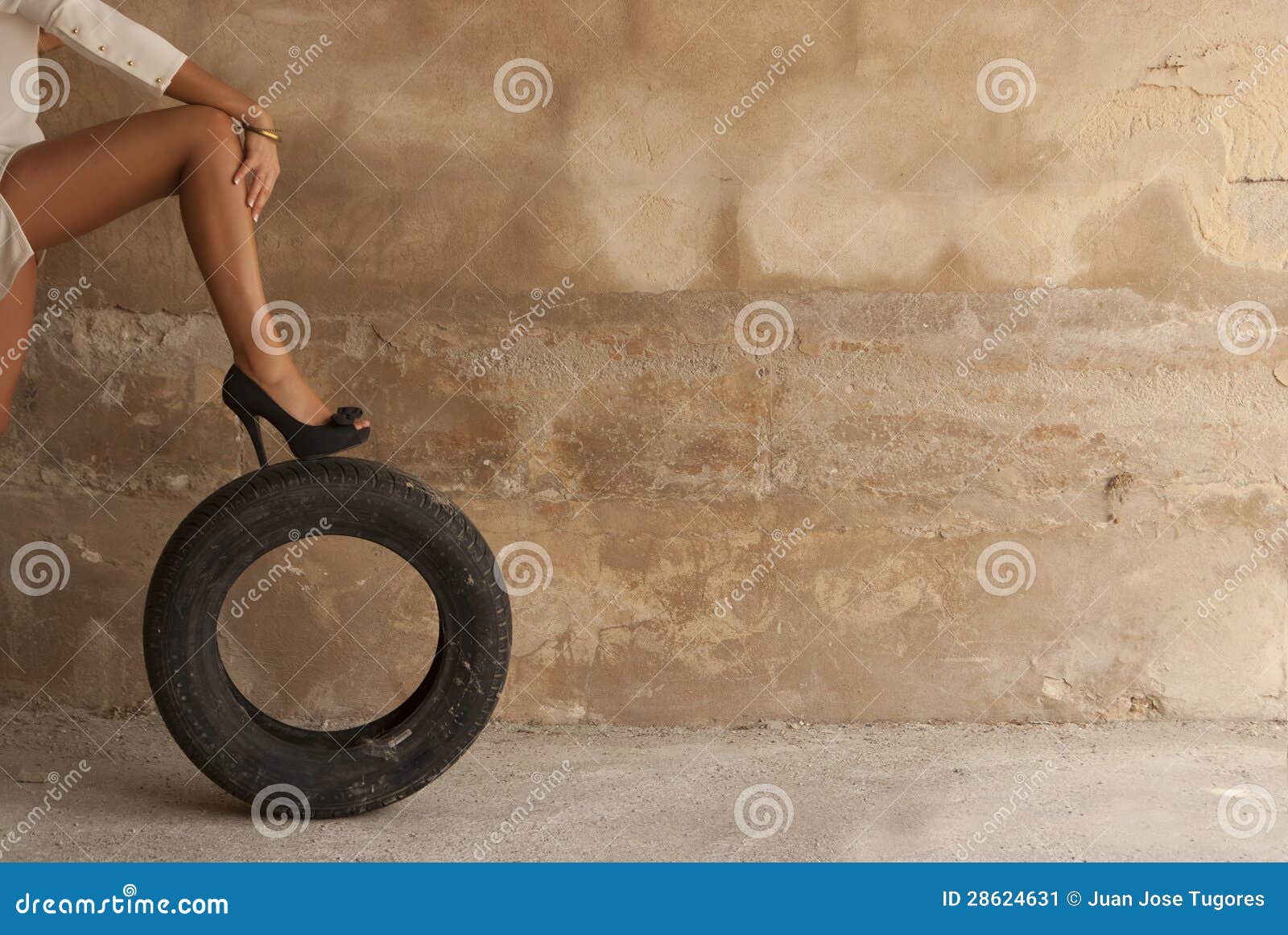 Woman with leg on tire stock image. Image of female, rubber 28624631