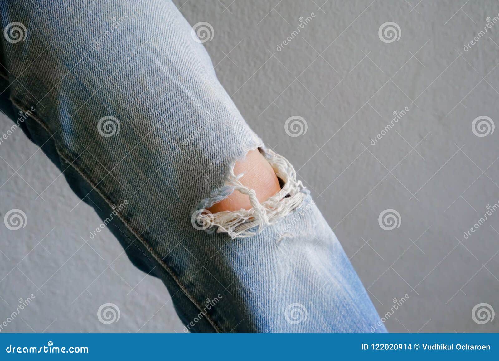 Woman Leg Wearing Jeans Torn Denim Against White Wall Background Stock ...