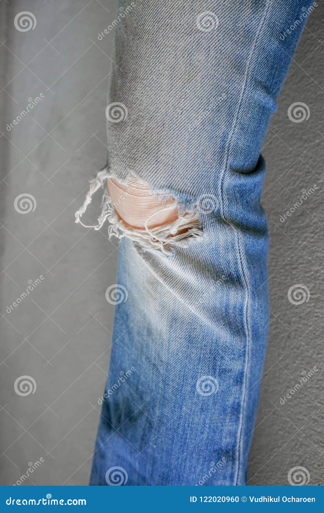 Woman Leg Wearing Jeans Torn Denim Against White Wall Background Stock ...