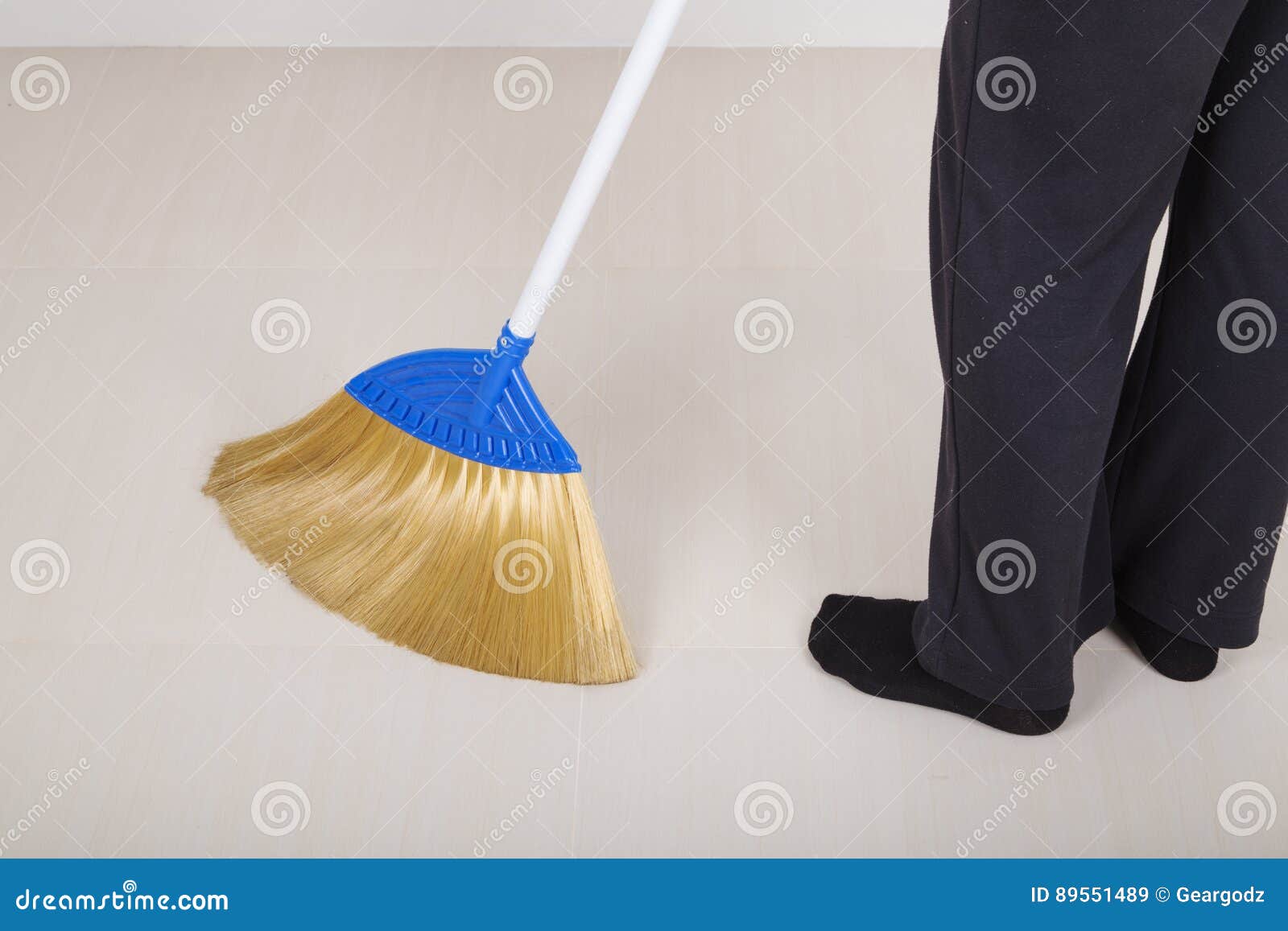 Woman Legs with Broom Sweeping Floor Stock Image Image of cleanup, person 89551489