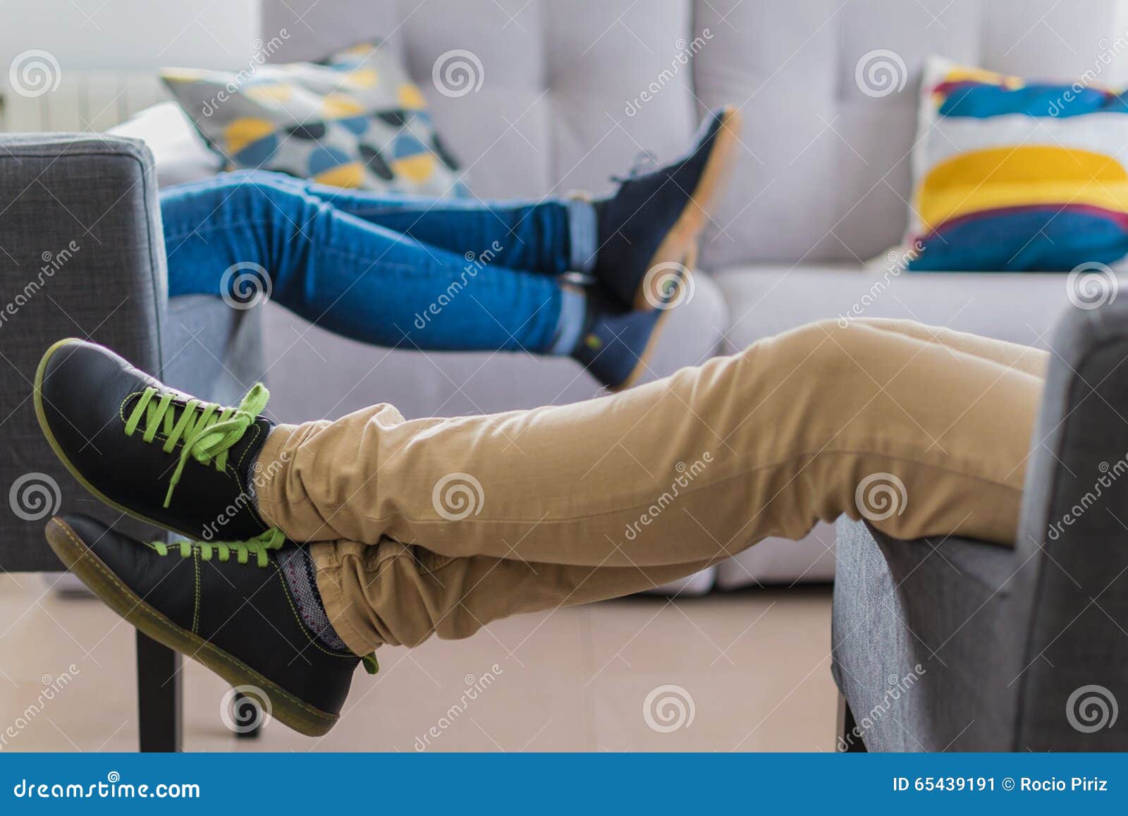 Woman Legs Resting on the Couch Armrest Stock Image - Image of shoe ...