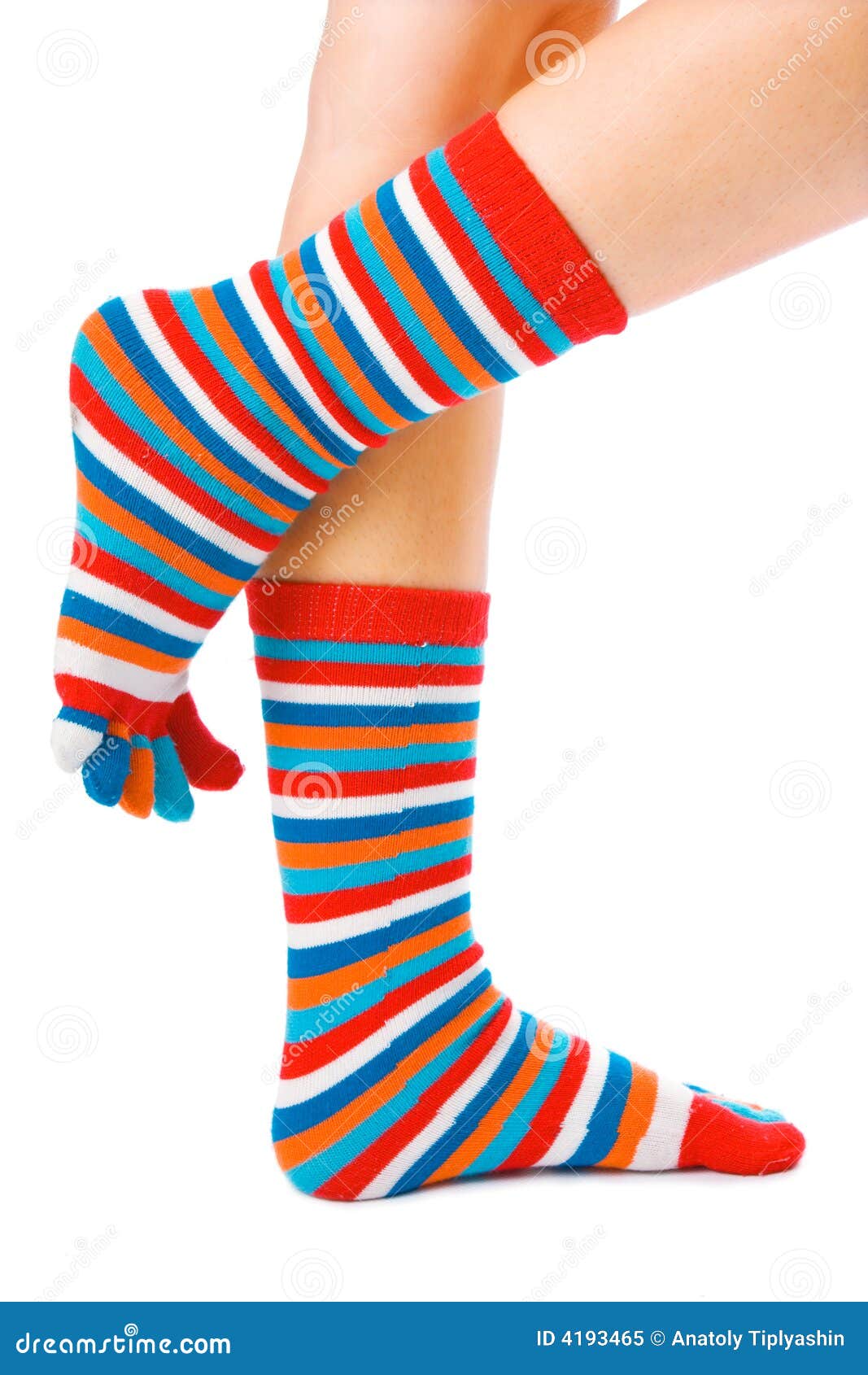 Woman legs in strip sock stock image. Image of positive - 4193465