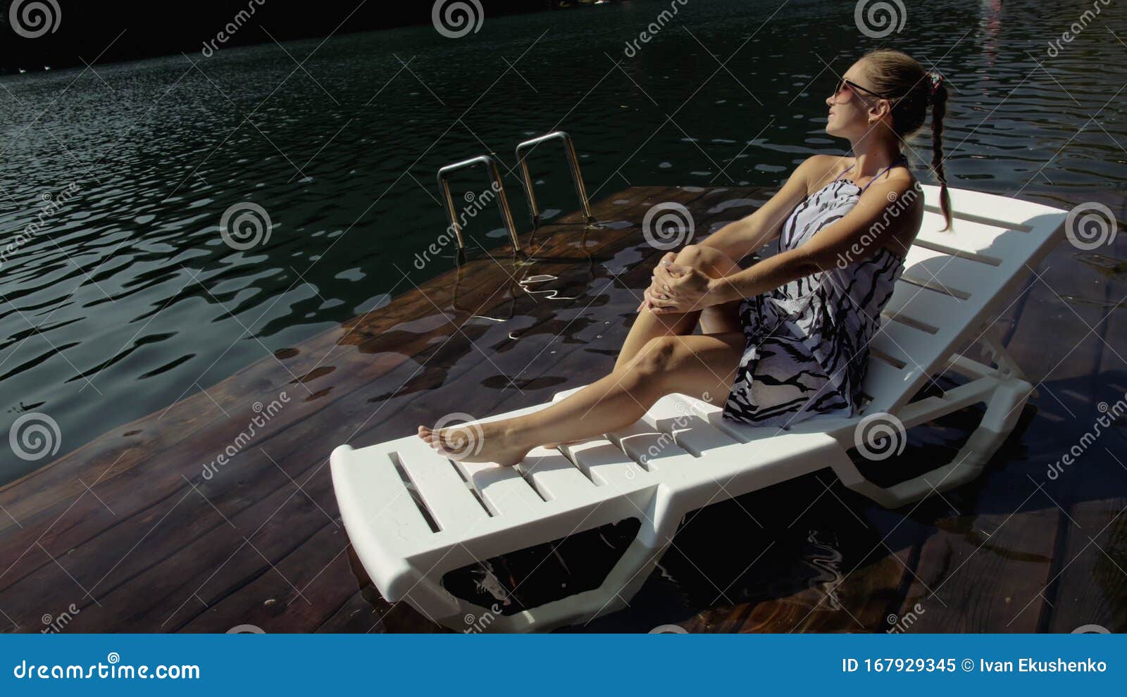 Woman Lie on a Sunbed in Sunglasses and a Boho Silk Shawl. Girl Rest on ...