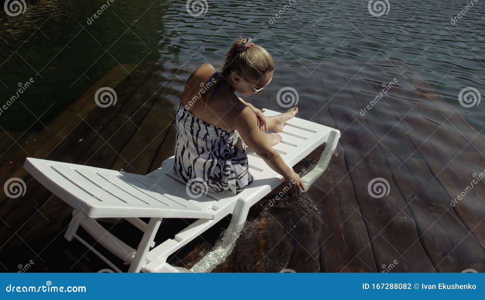 Woman Lie on a Sunbed in Sunglasses and a Boho Silk Shawl. Girl Rest on ...