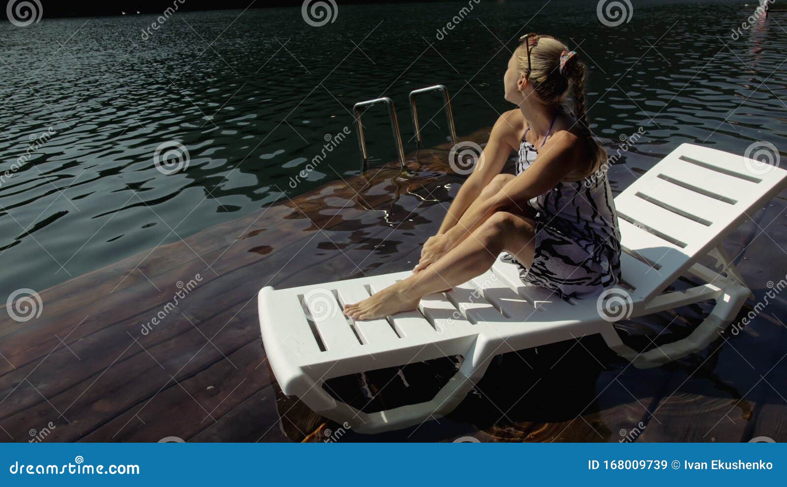 Woman Lie on a Sunbed in Sunglasses and a Boho Silk Shawl. Girl Rest on ...