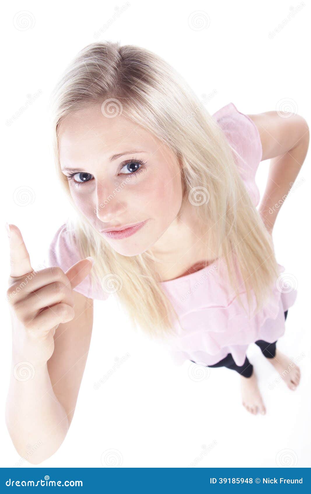 Woman lift finger. Blond young woman lifts the finger