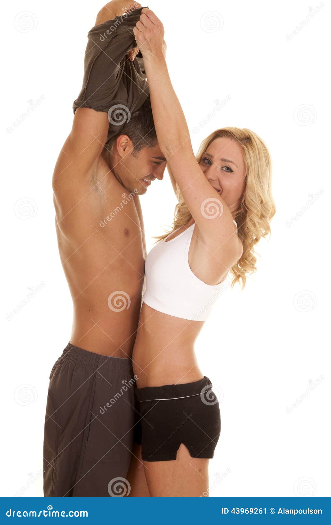 Fitness Woman Taking Off Her T-shirt Stock Photo 376152541