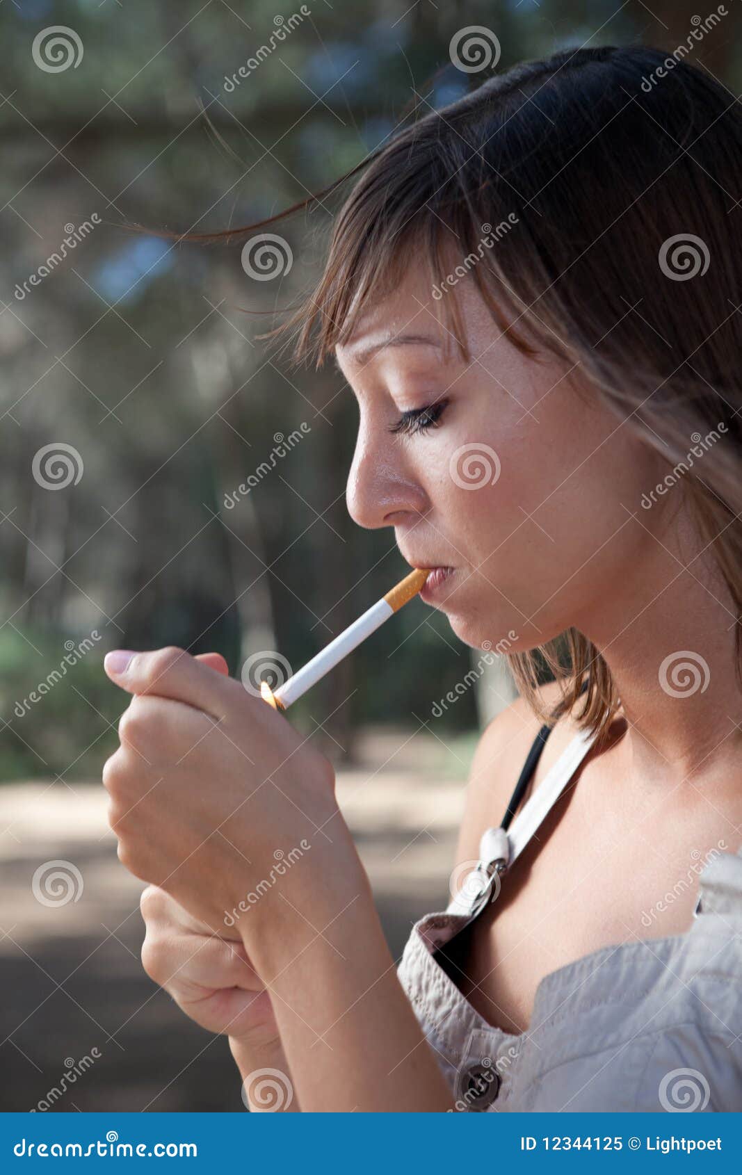 Woman Lighting A Cigarette Royalty Free Stock Photo Image 12344125