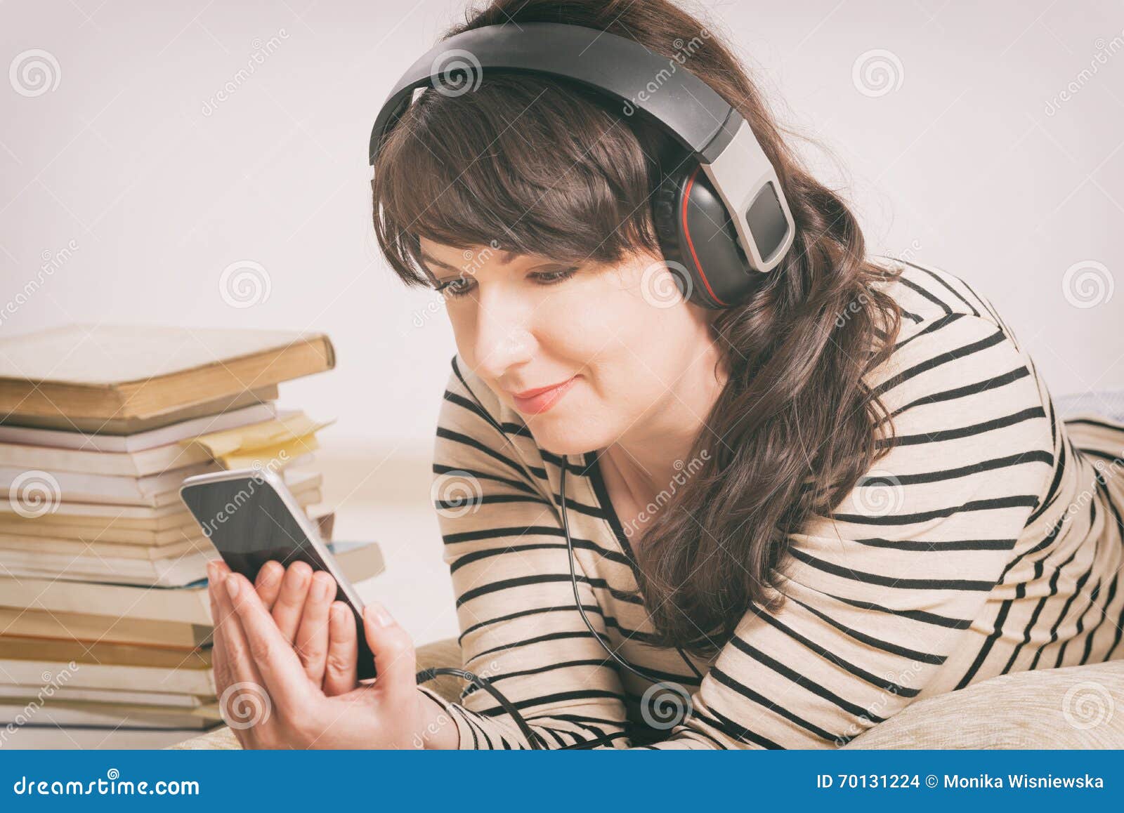 Woman Listening An Audiobook Stock Photo Image 70131224