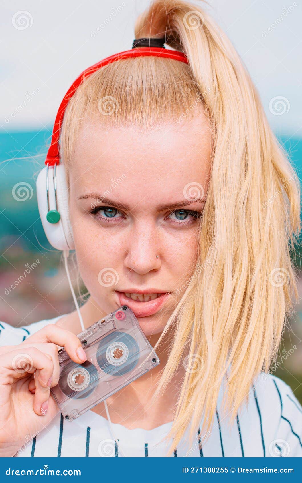 Woman Listening Music With Cassette And Headphones Emotional Portrait