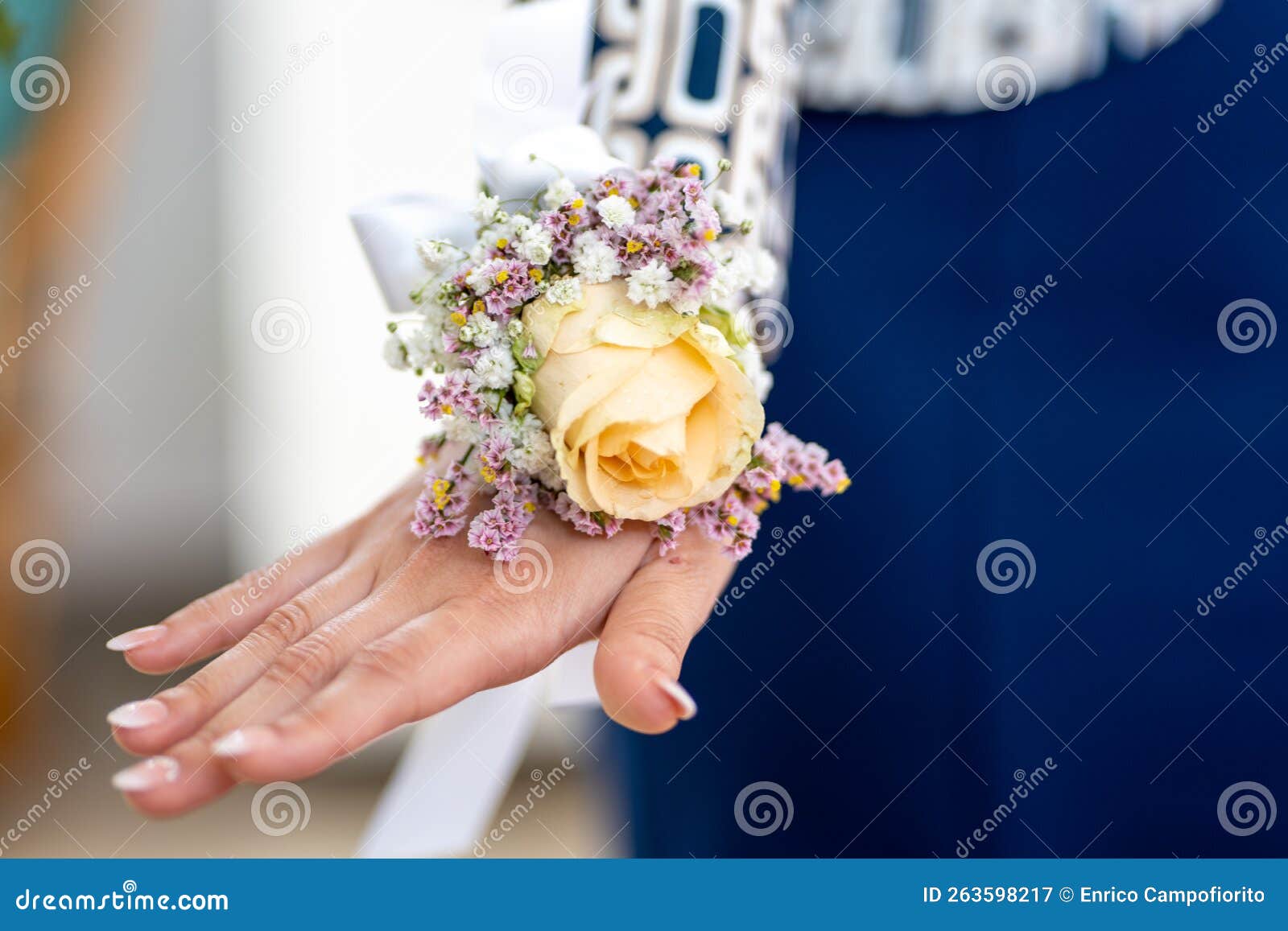 woman and with little wrist bouquet