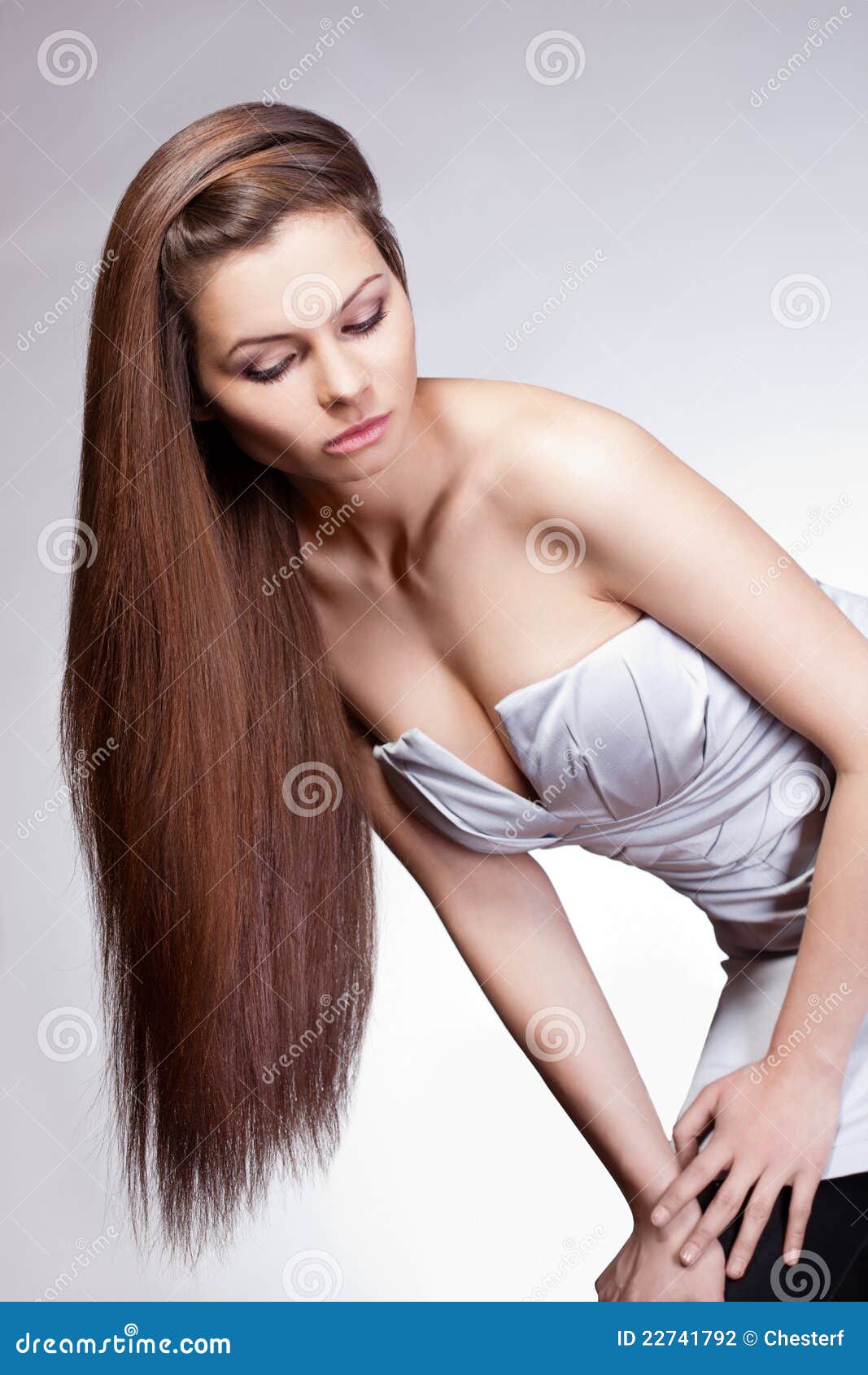 Woman with Long Hair Looking Down Stock Photo Image of hairdo, brown
