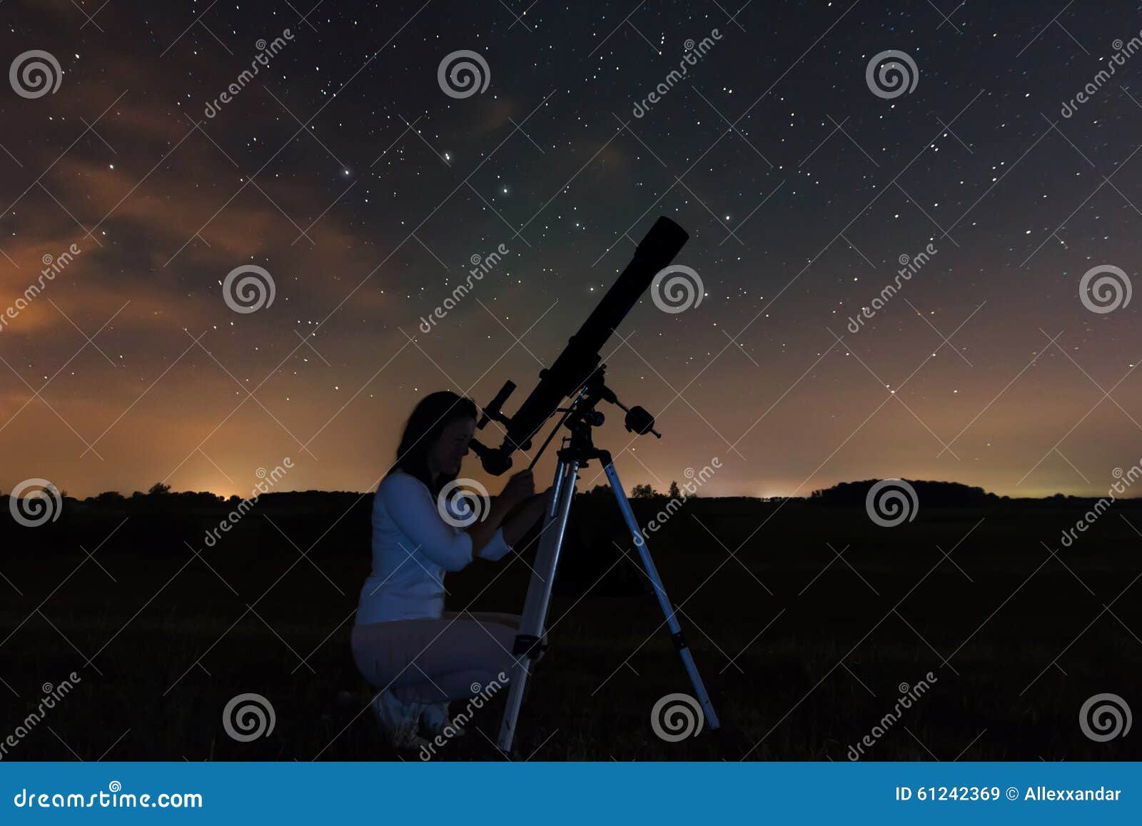 woman and night sky. watching the stars