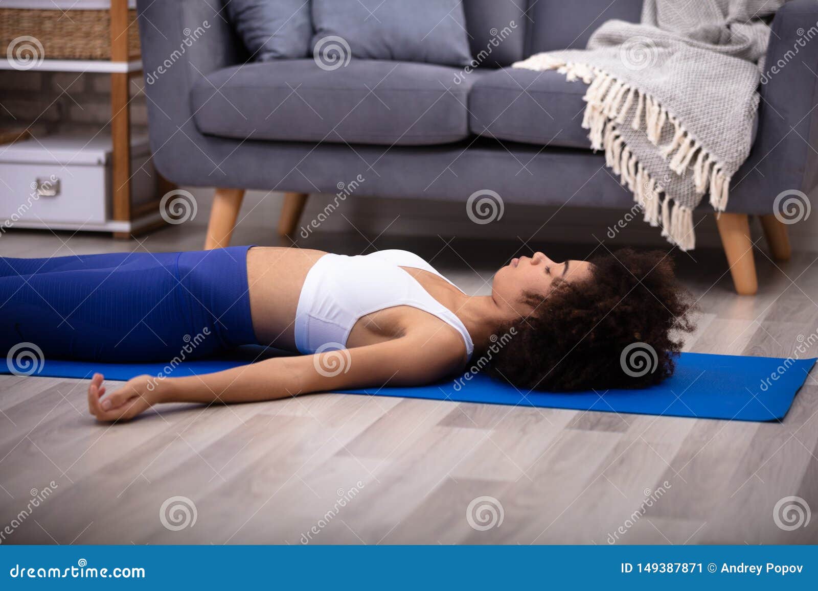Woman Lying On Blue Yoga Mat Stock Image Image Of Exercise Home