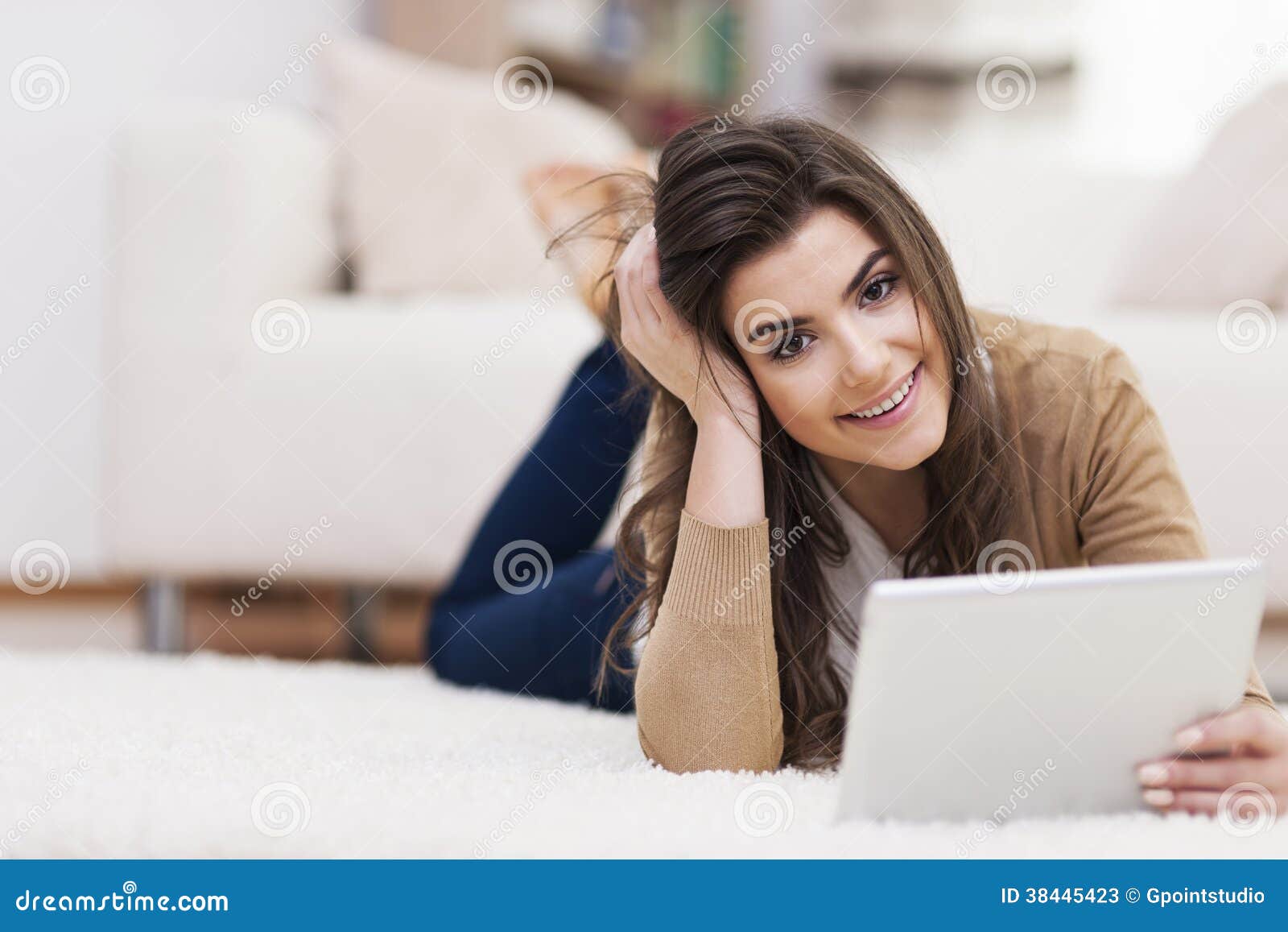 Woman lying down on carpet stock image. Image of domestic - 38445423