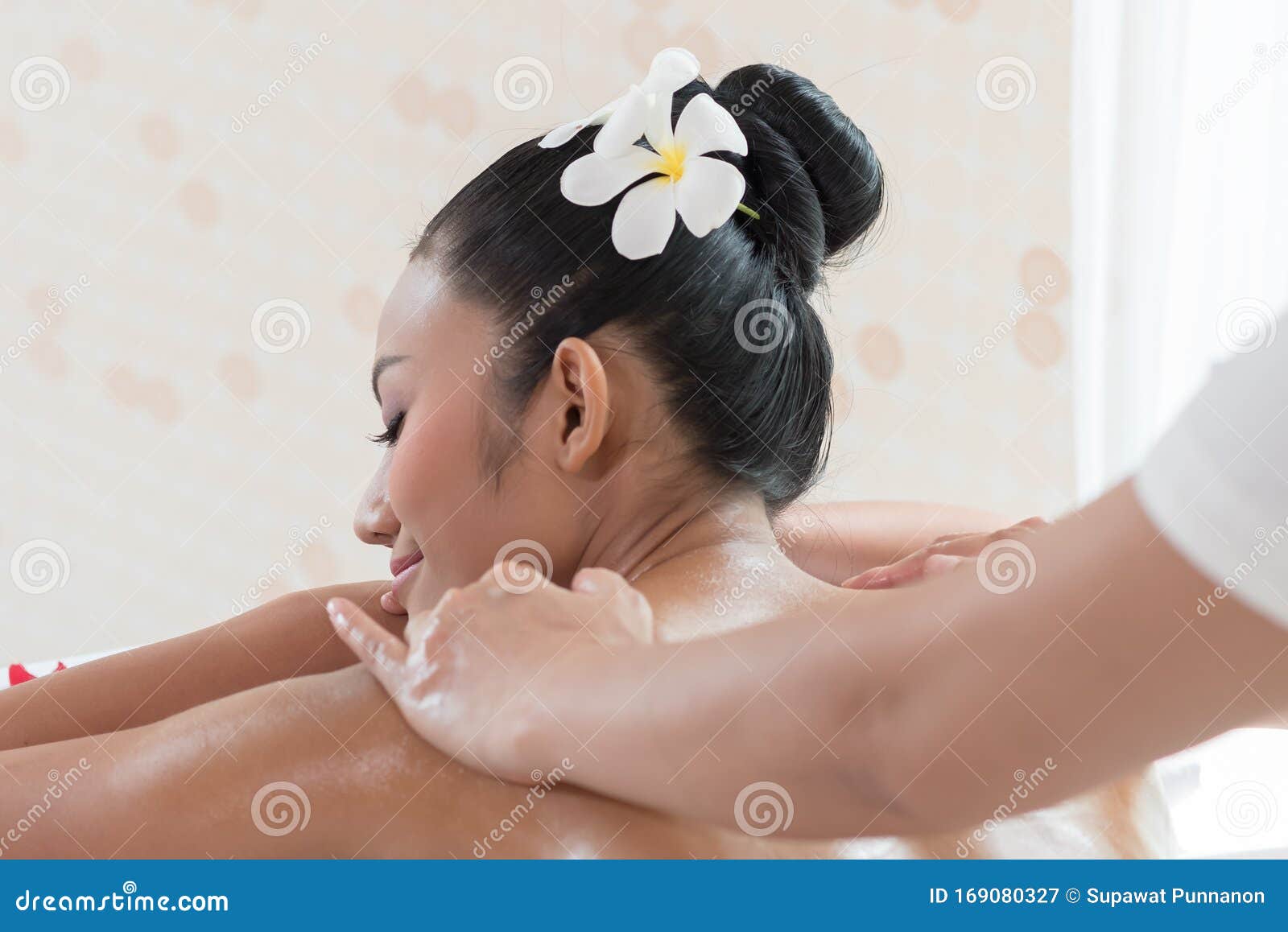 Woman Lying Down On A Massage Bed At A Spa Stock Image Image Of Hotel