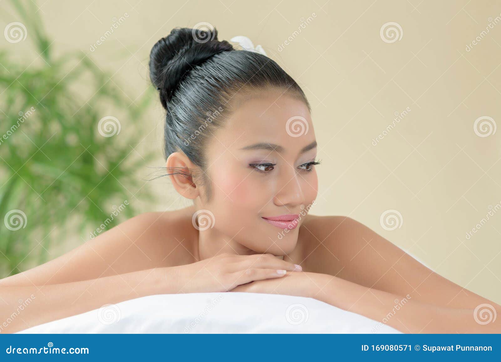 Woman Lying Down Relaxing on a Massage Bed at a Spa Stock Image Image