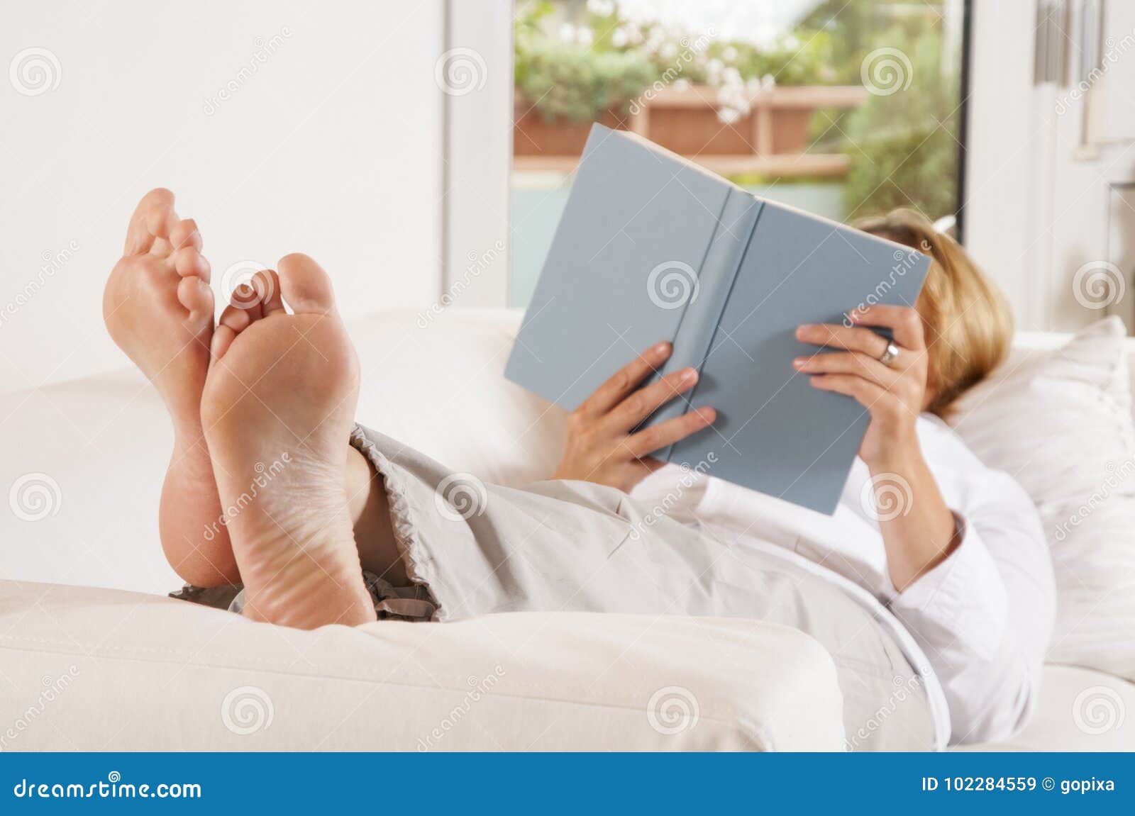 Beautiful Woman With Prosthetic Leg Reading Book Free Stock Photo and Image  326059374