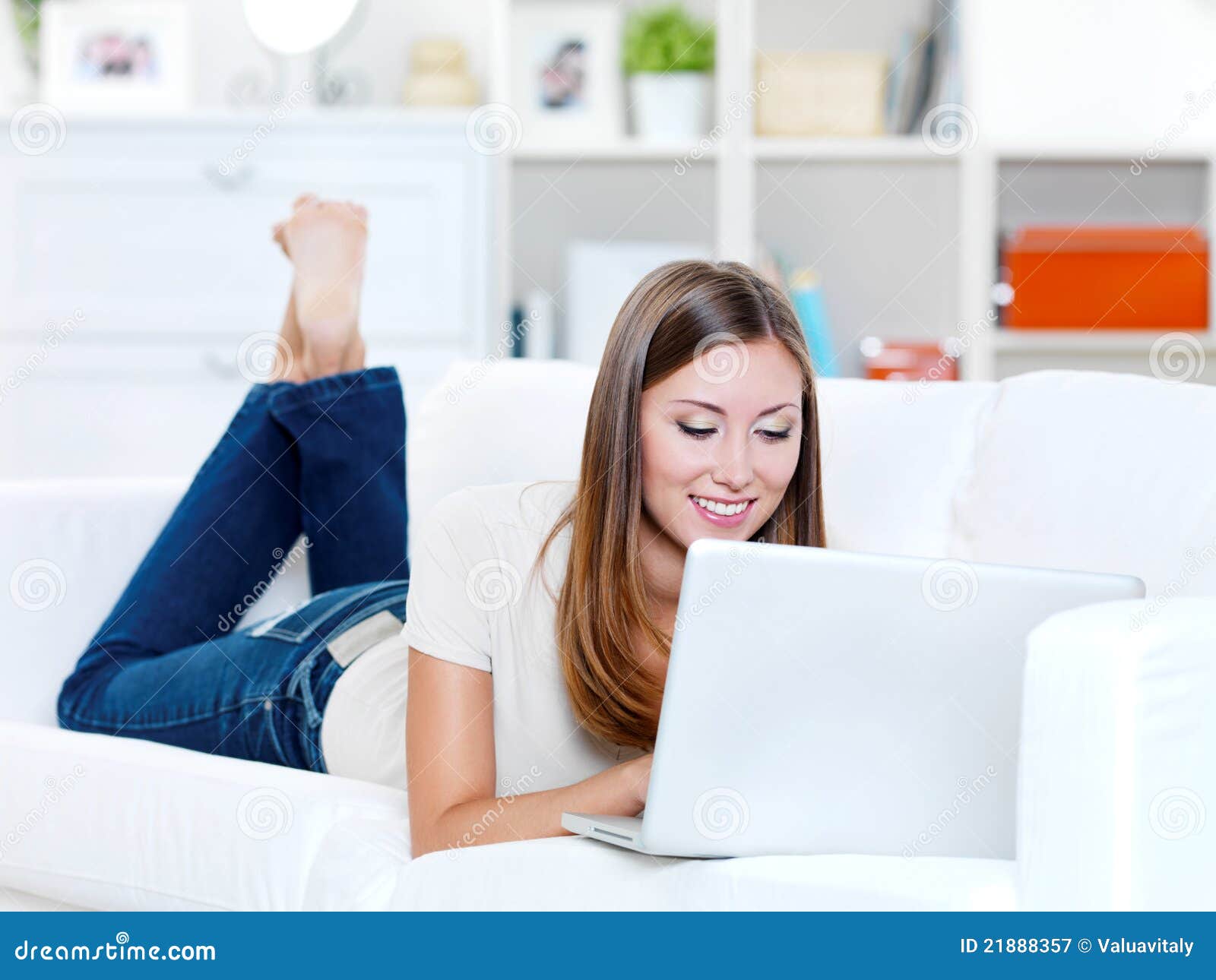 Woman Lying on the Sofa with Laptop Stock Image - Image of ...