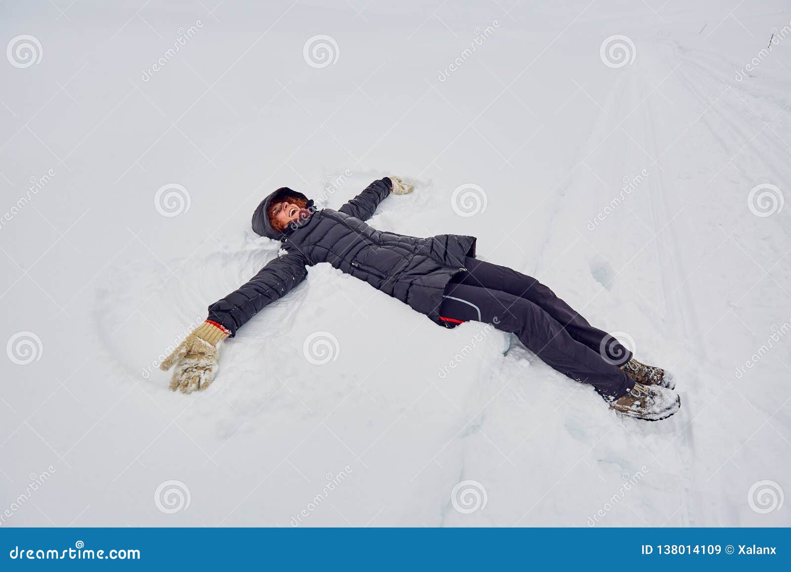 Woman Making Snow Angels Stock Image Image Of Play 138014109