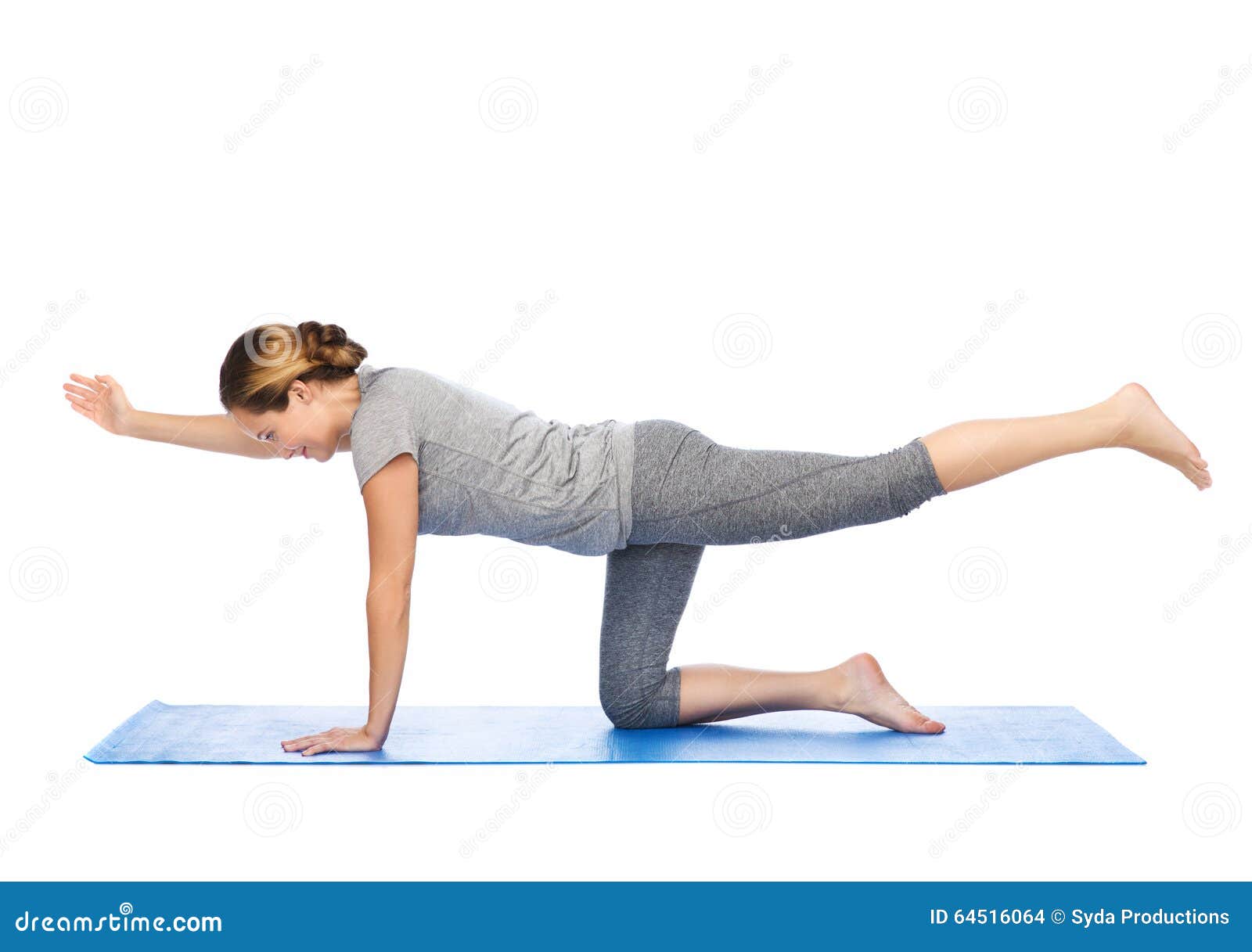 Woman Making Yoga In Balancing Table Pose On Mat Stock ...