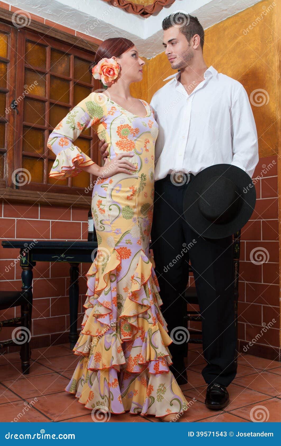 woman and man during the feria de abril on april spain