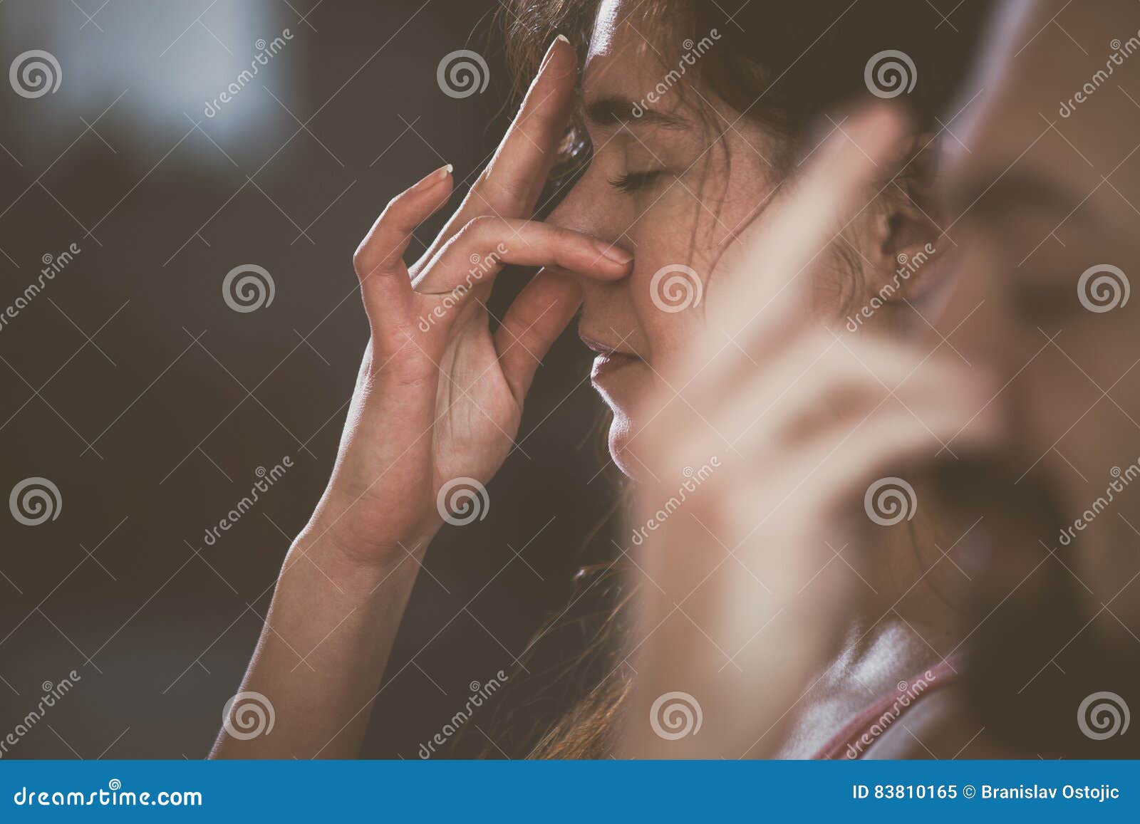 woman and man practice yoga breathing technique