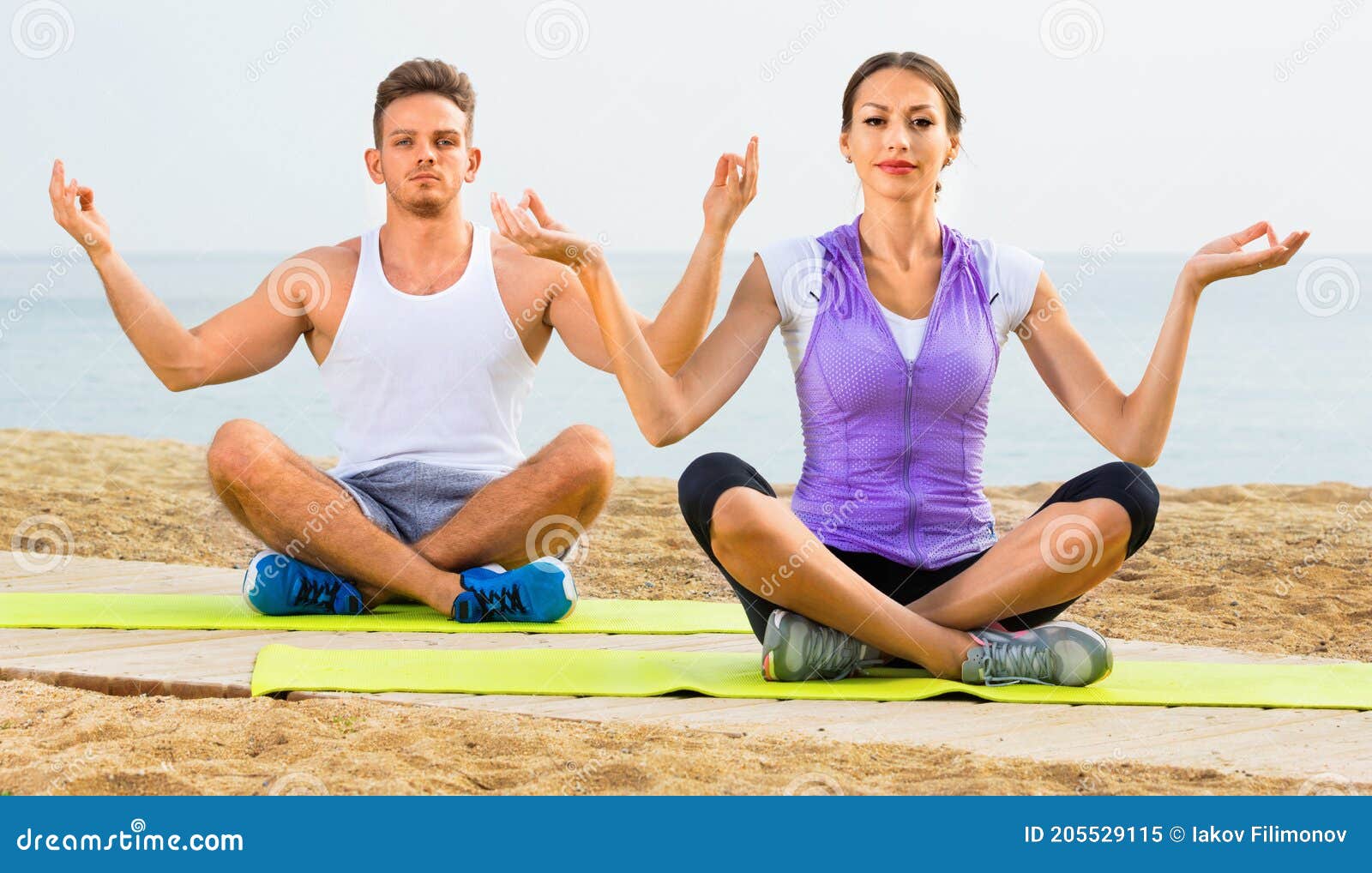 Sporty Beautiful Young Man Practicing Yoga, Sitting Cross-legged in Adho  Mukha Padmasana, Bending Forward in Variation Stock Image - Image of  background, asana: 139327401