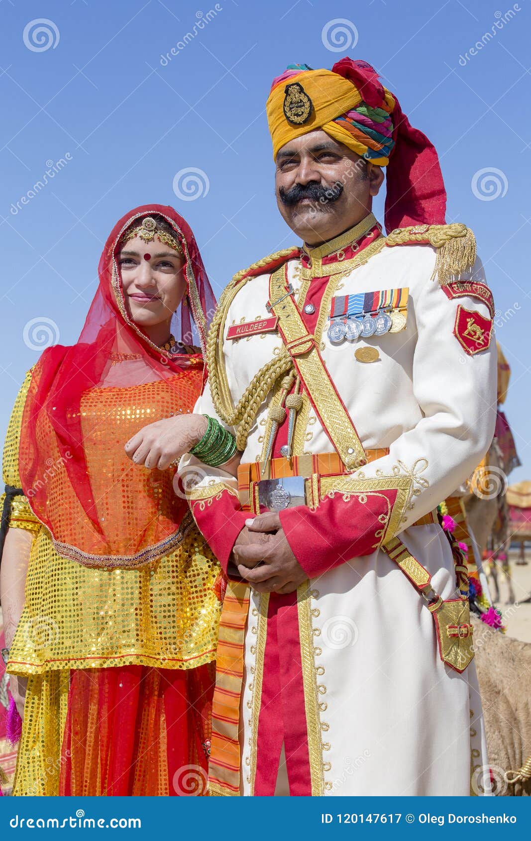 Woman and Man Wearing Traditional Rajasthani Dress Participate in ...