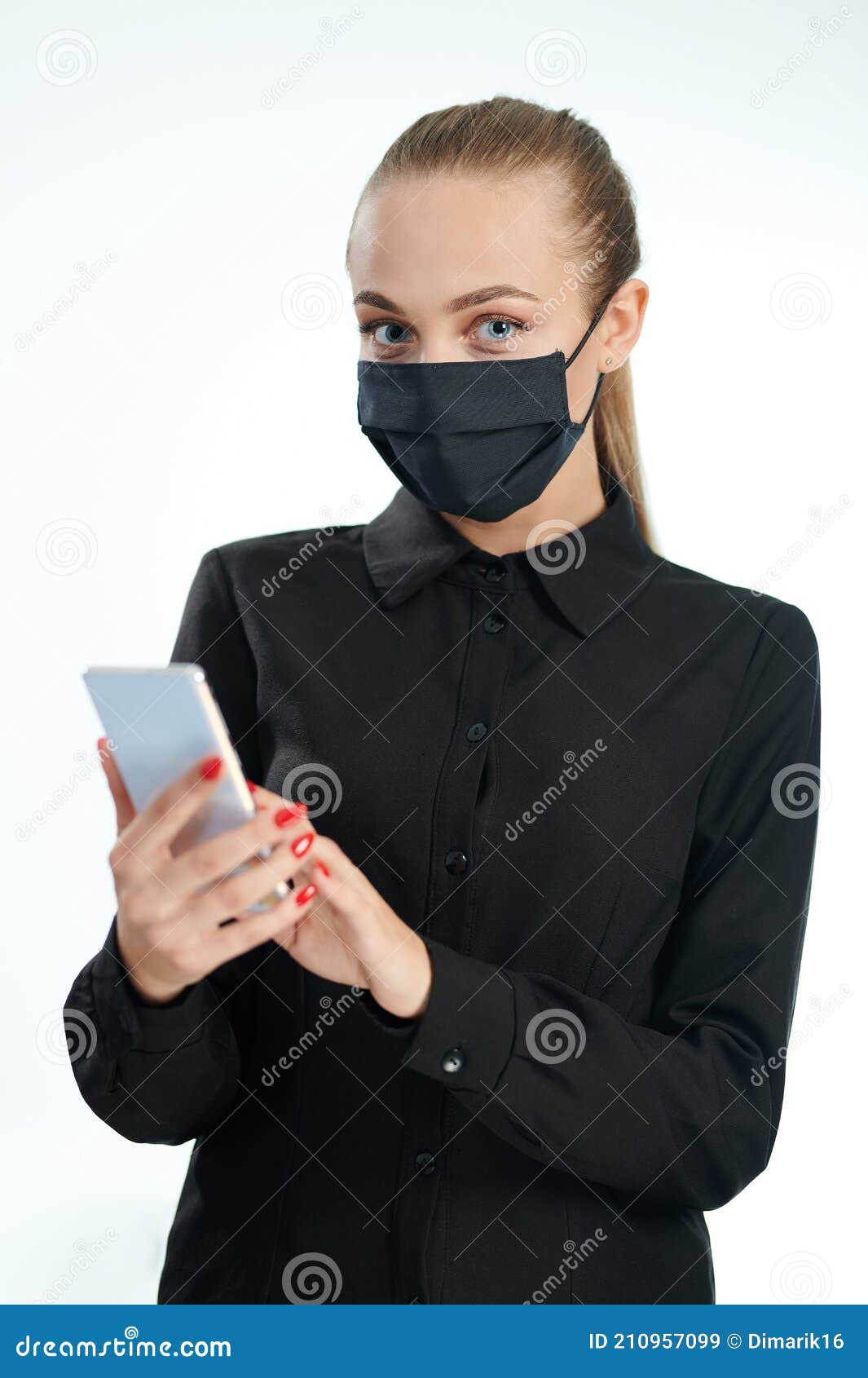 Woman in mask wearing mask stock image. Image of wearing 210957099
