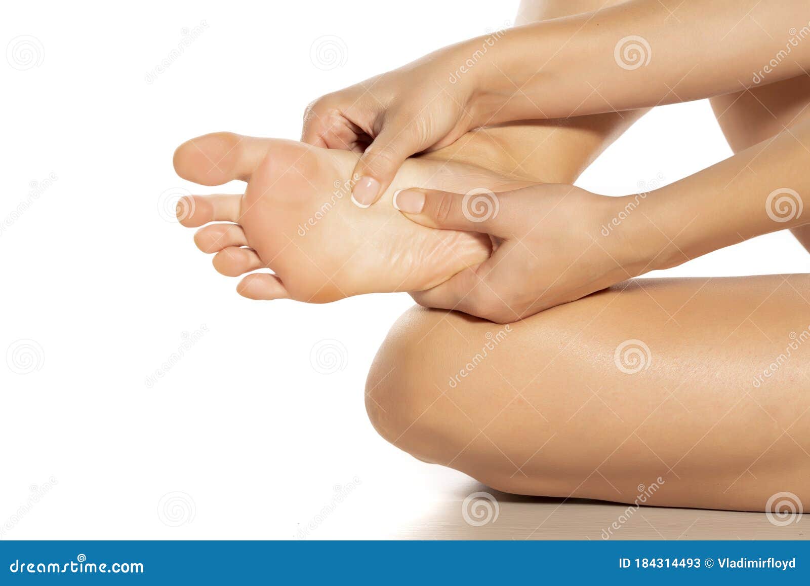 Woman Massaging Her Painful Foot On White Stock Image Image Of Feet