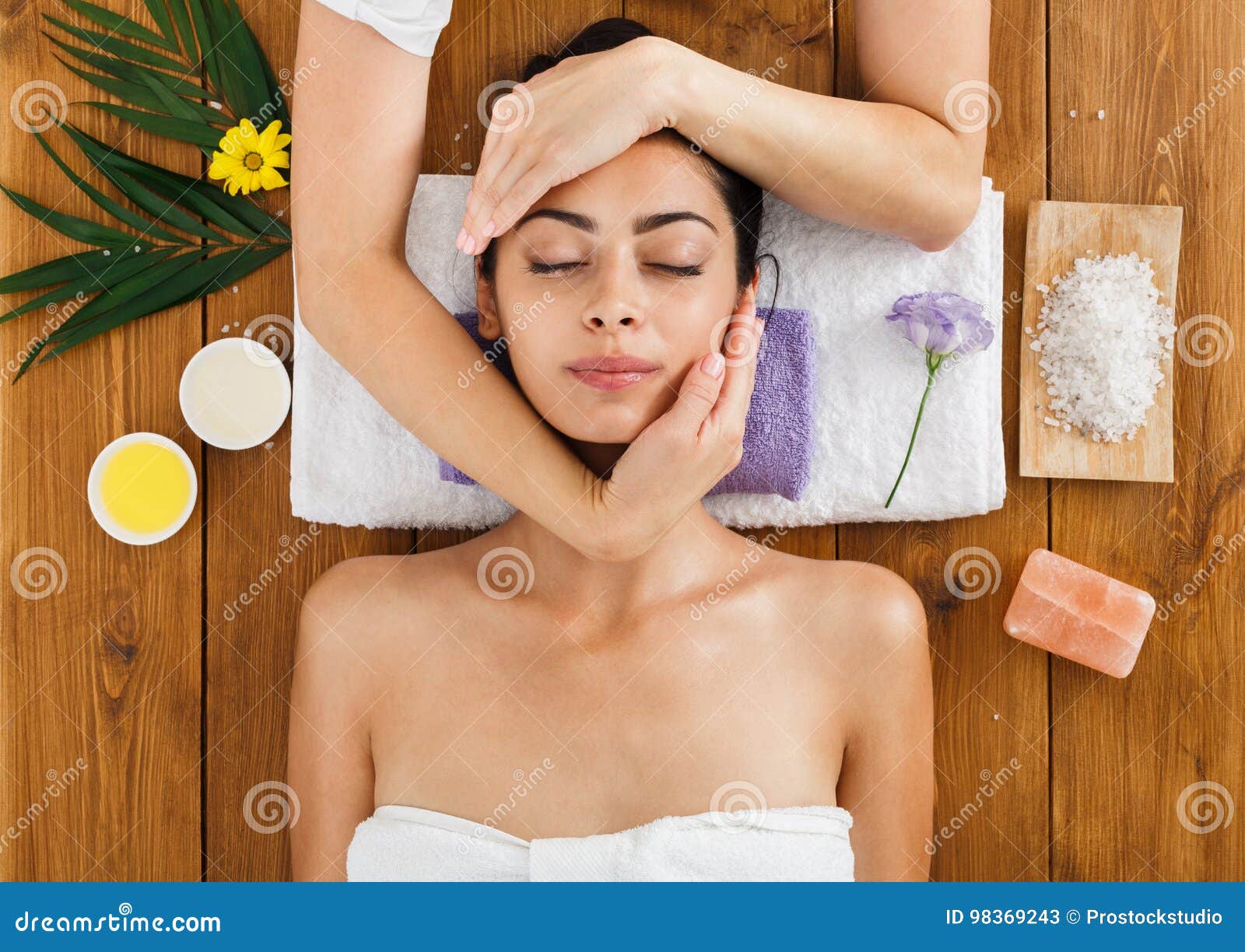 Woman Massagist Make Face Lifting Massage In Spa Wellness Center Stock