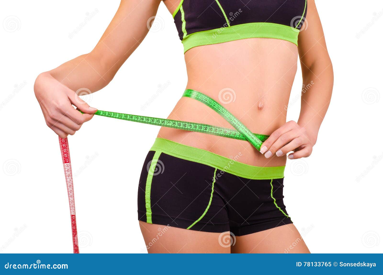 woman measures the abdominal circumference centimeter tape
