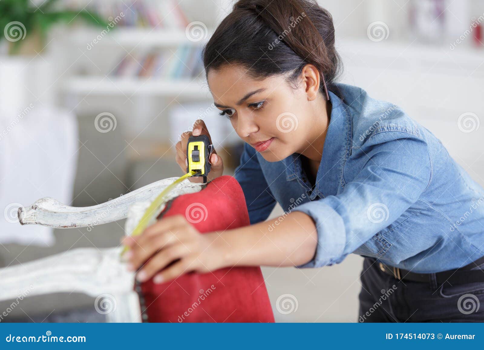 Woman Measuring Chair before Upholstering it Stock Image Image of