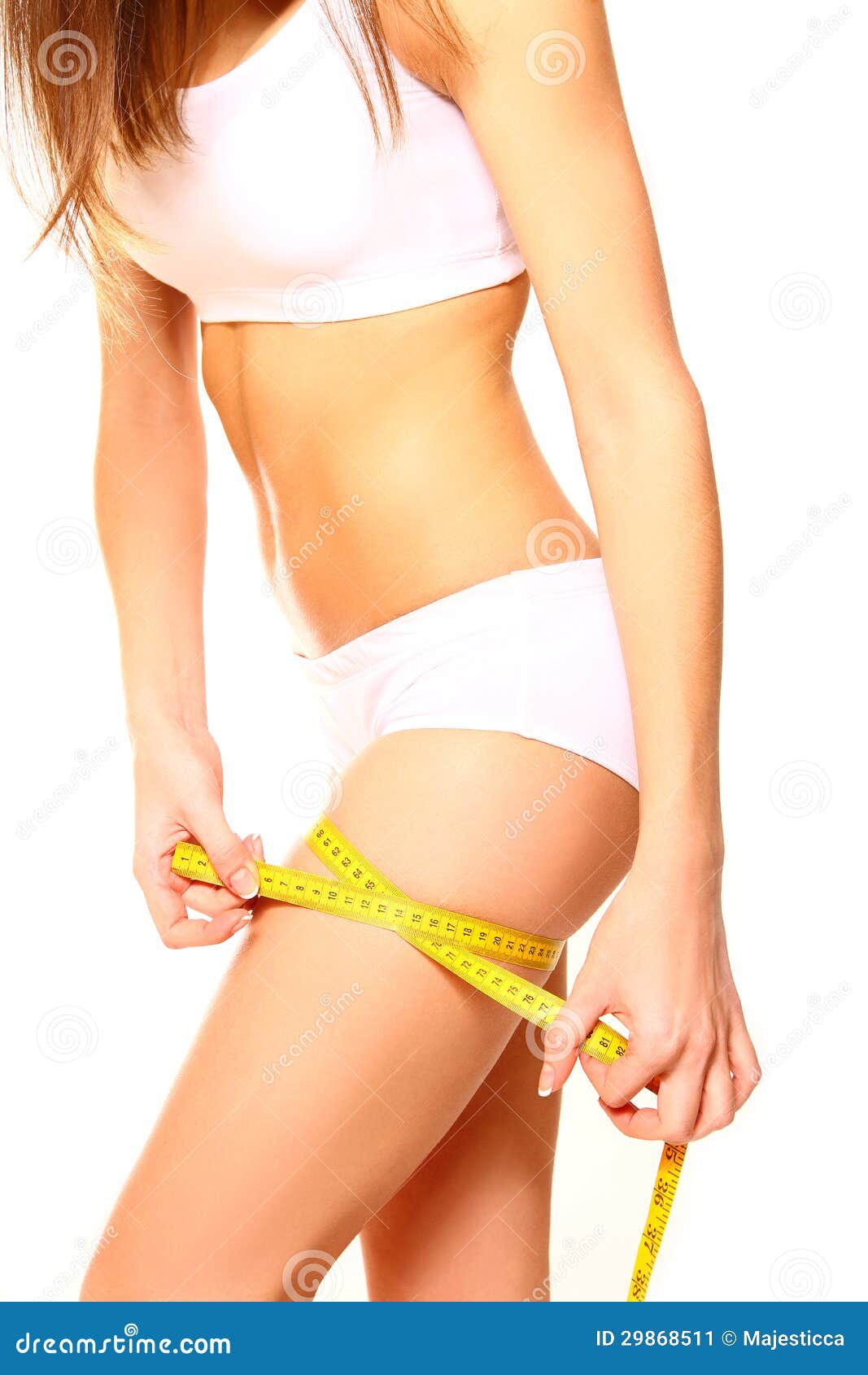 Premium Photo  Woman measuring thigh with yellow measuring tape. body  check. diet fitness concept.