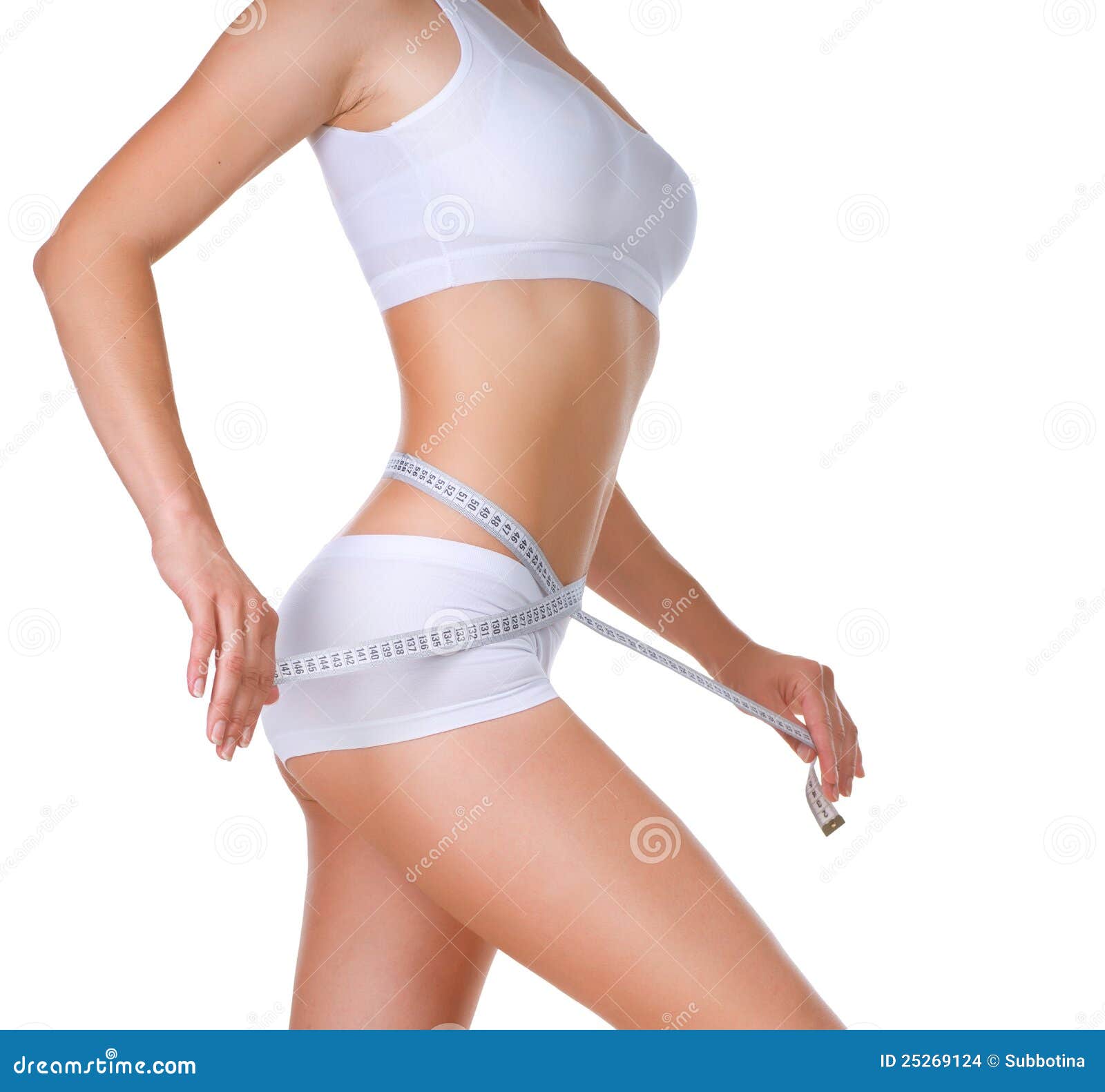 woman measuring her waistline. diet