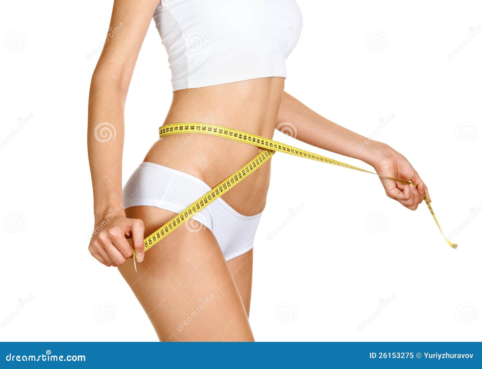 woman measuring her waistline. perfect slim body