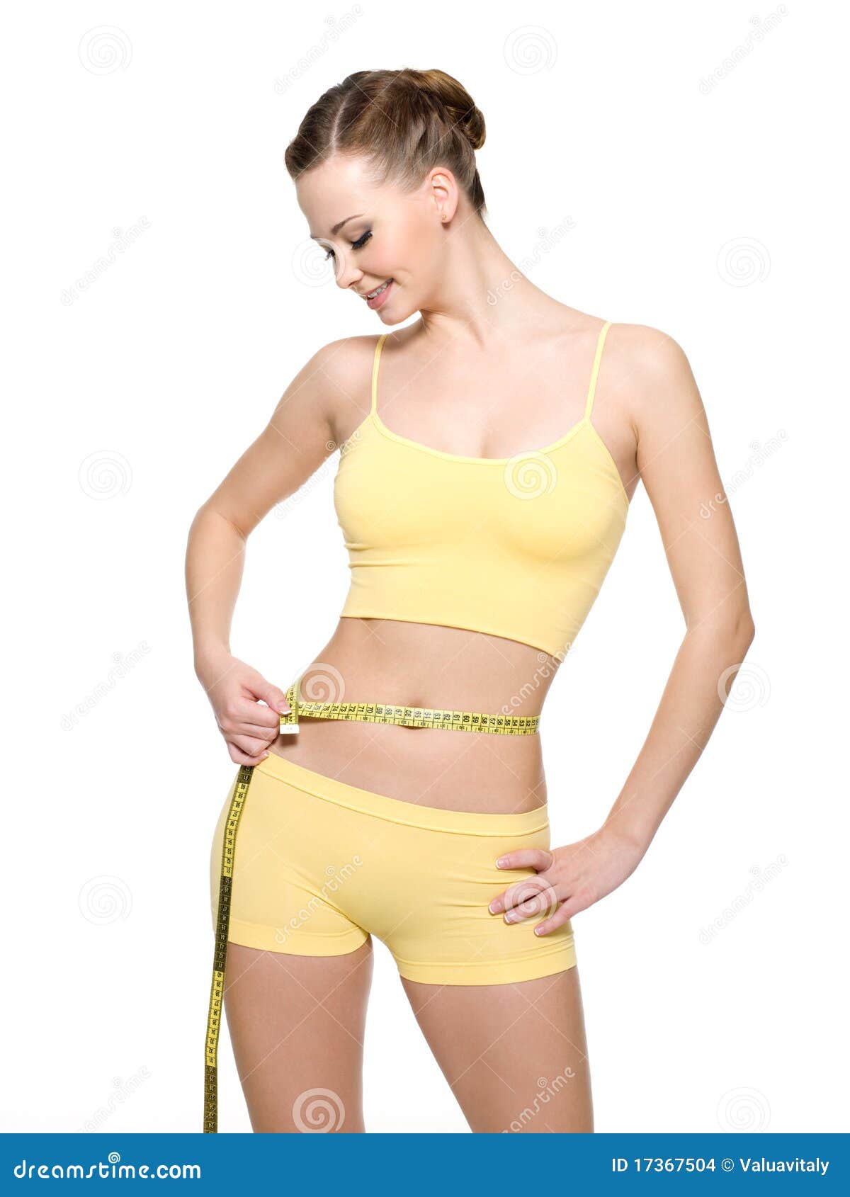 Premium Photo  Close up of slim woman measuring her waist's size