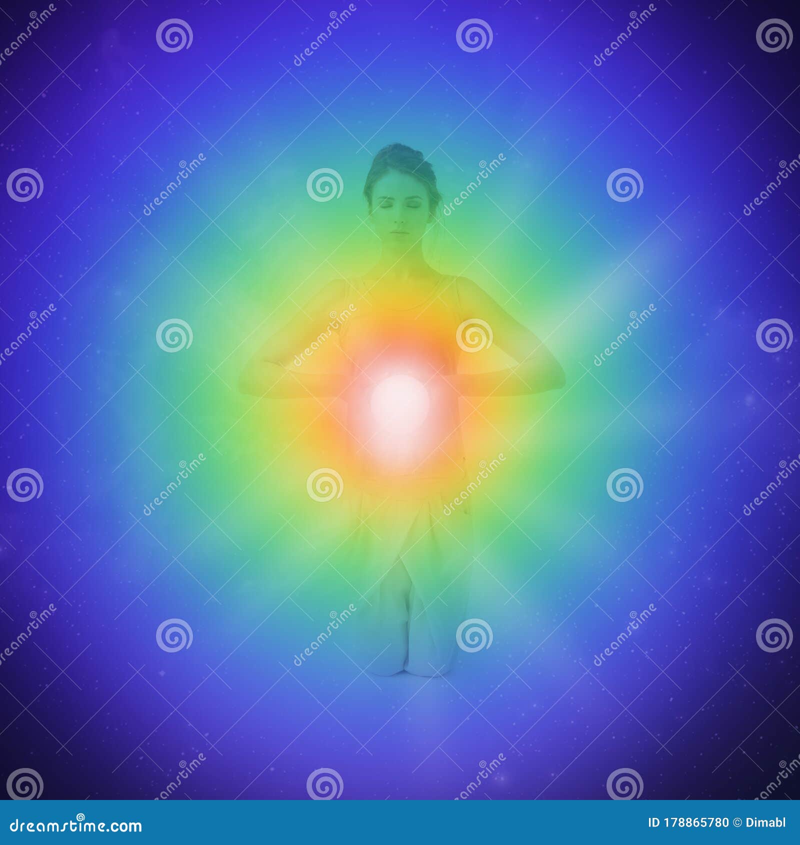 Seven Chakras concept. Woman meditating. Colored chakra lights over her body. Yoga, zen, Buddhism, recovery and wellbeing concept.