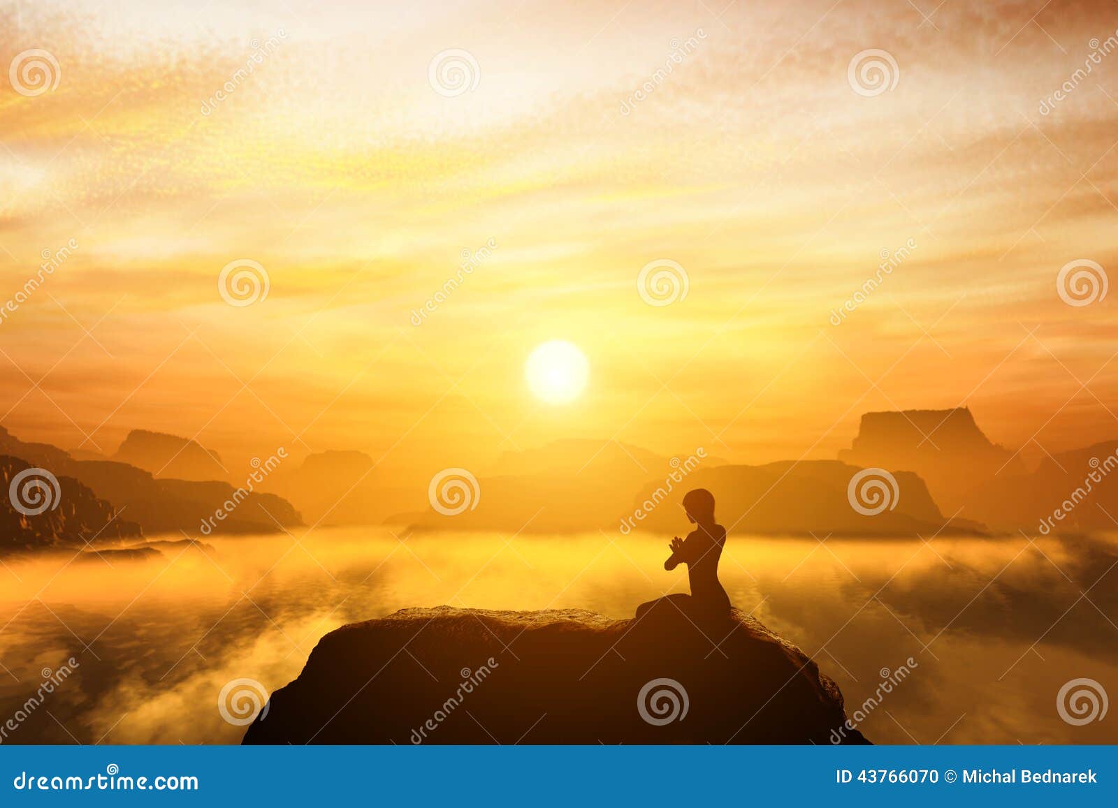 woman meditating in sitting yoga position on the top of a mountains