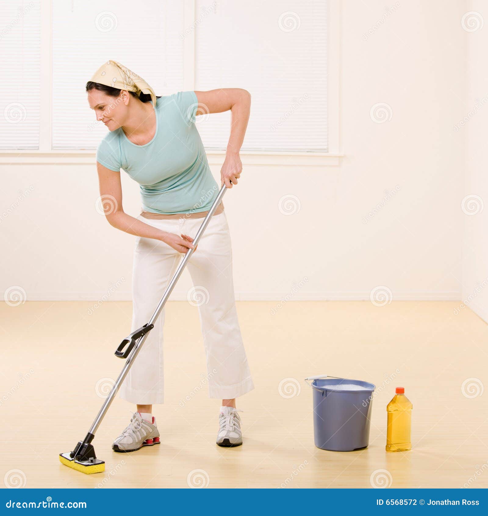 Woman Mopping Floor With Cleaner Stock Photography - Image ...