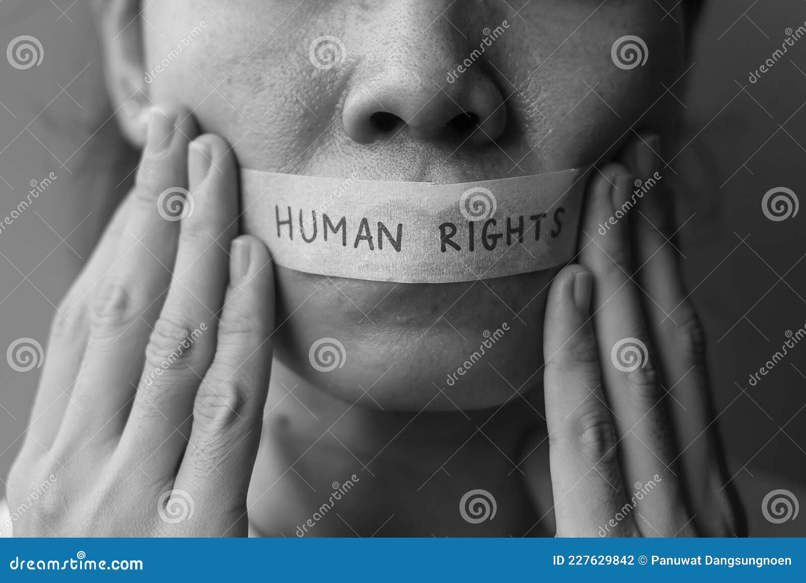 woman with mouth sealed in adhesive tape with human rights message. free of speech, freedom of press, protest dictatorship,