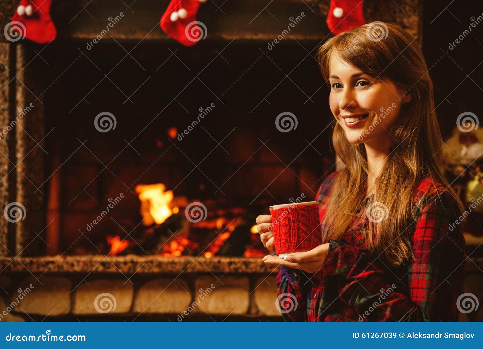 Woman with a Mug by the Fireplace. Young Attractive Woman Stock Image ...