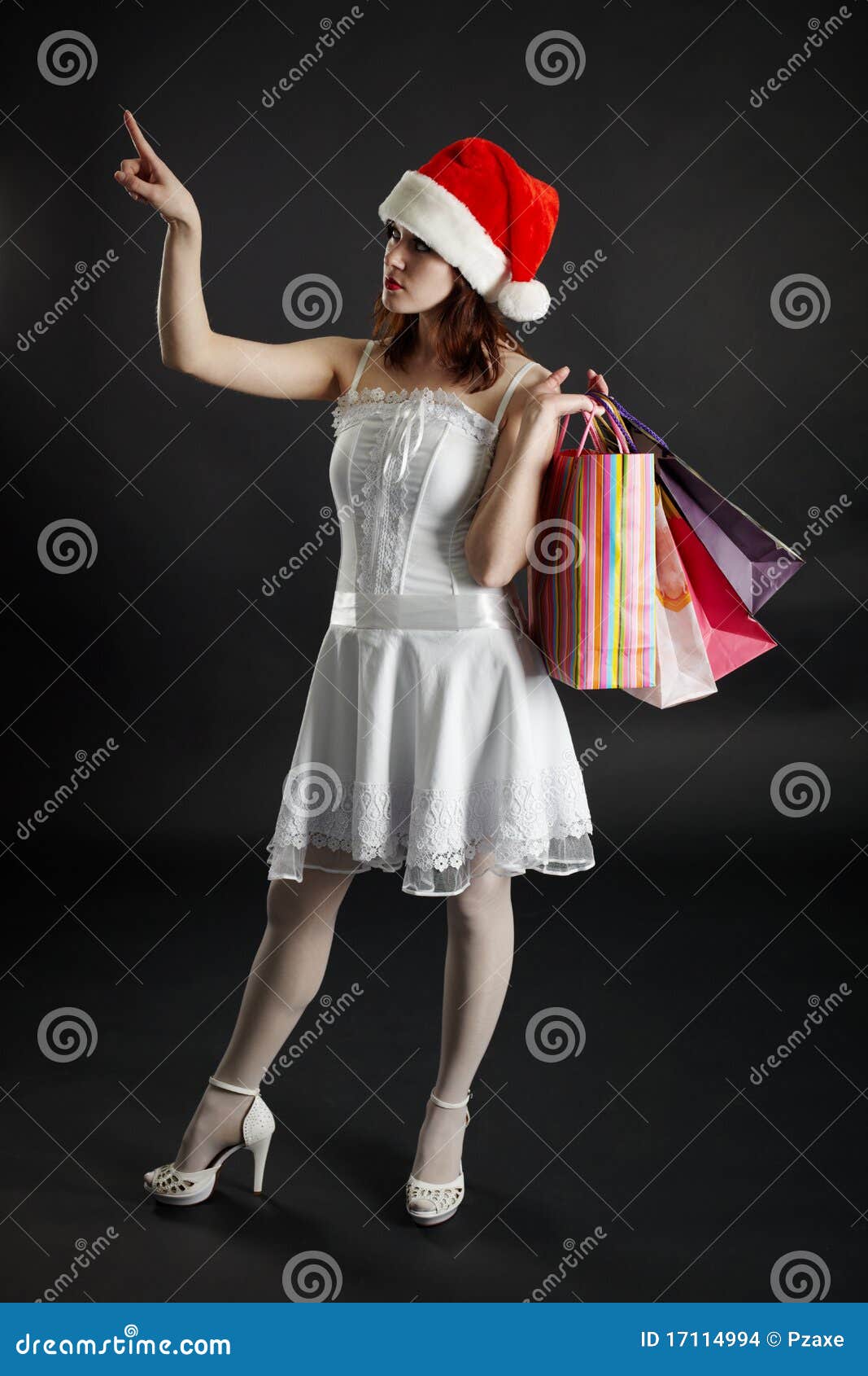 woman in new year's cap chooses purchases