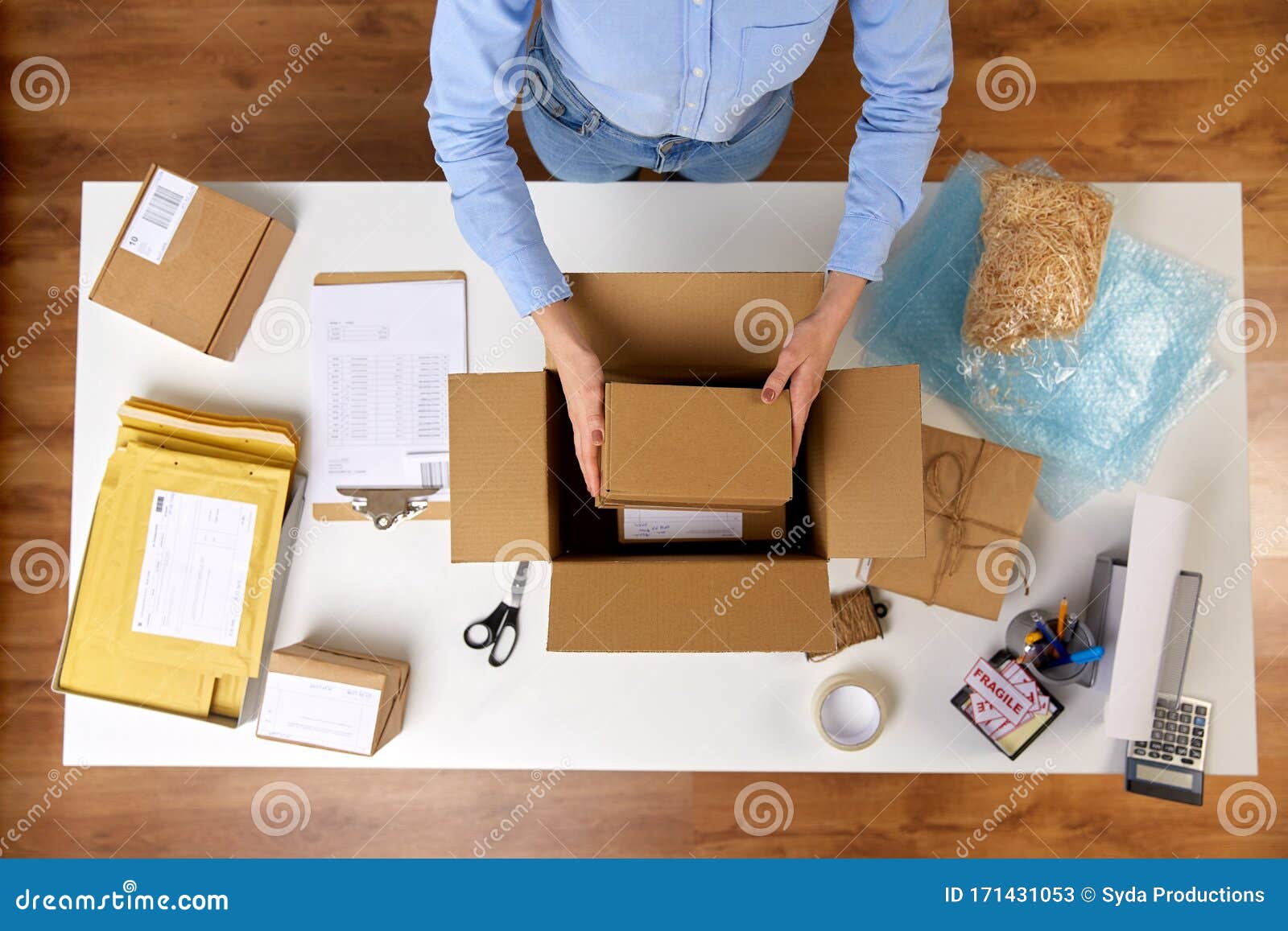 Woman Packing Fragile Parcel Boxes at Post Office Stock Image - Image of  mail, indoors: 171431053