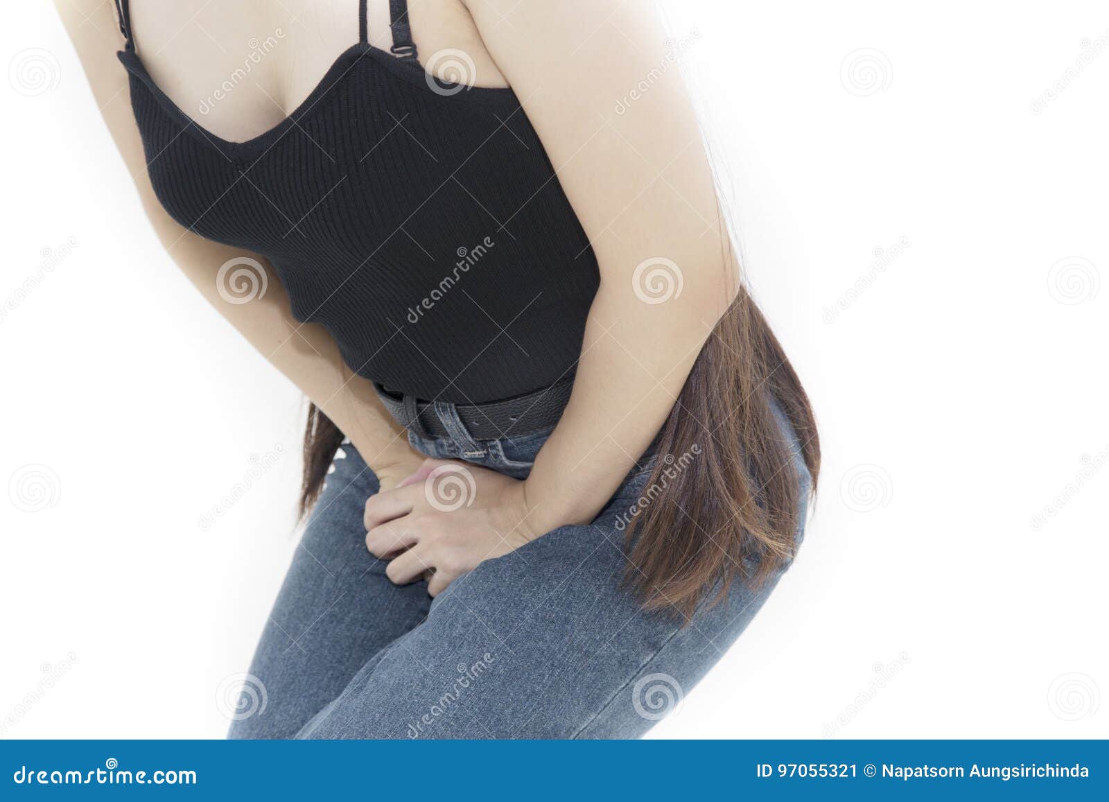 woman covering her crotch with a sad character drawn on paper Stock Photo