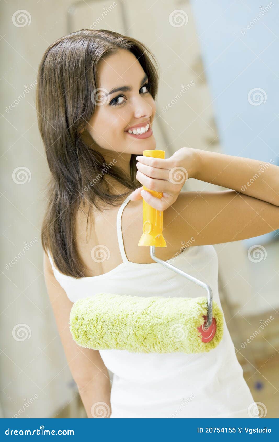 Woman with paint roller stock image. Image of estate 20754155