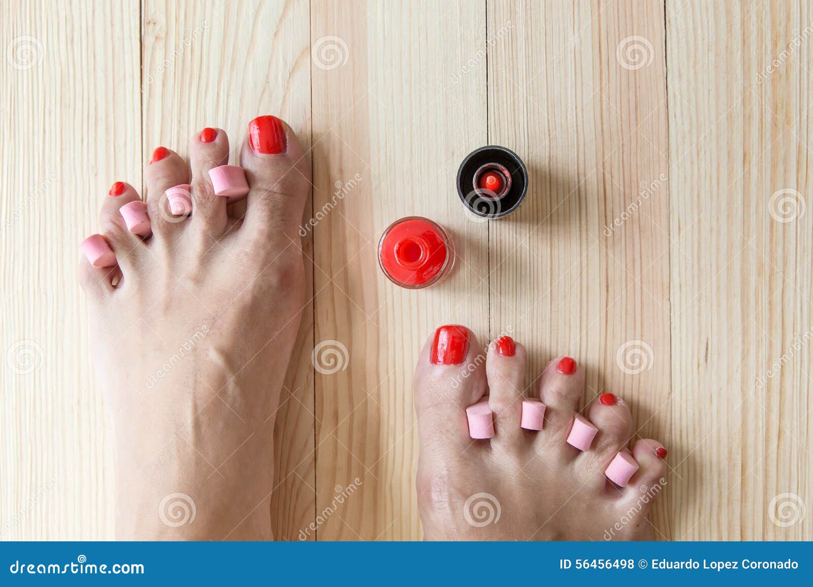 Woman painting toe nails stock photo. Image of beauty - 56456498