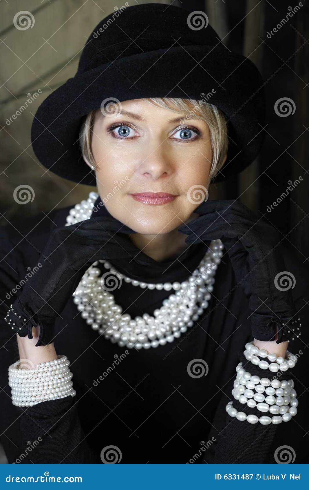 woman in pearls in her 40s